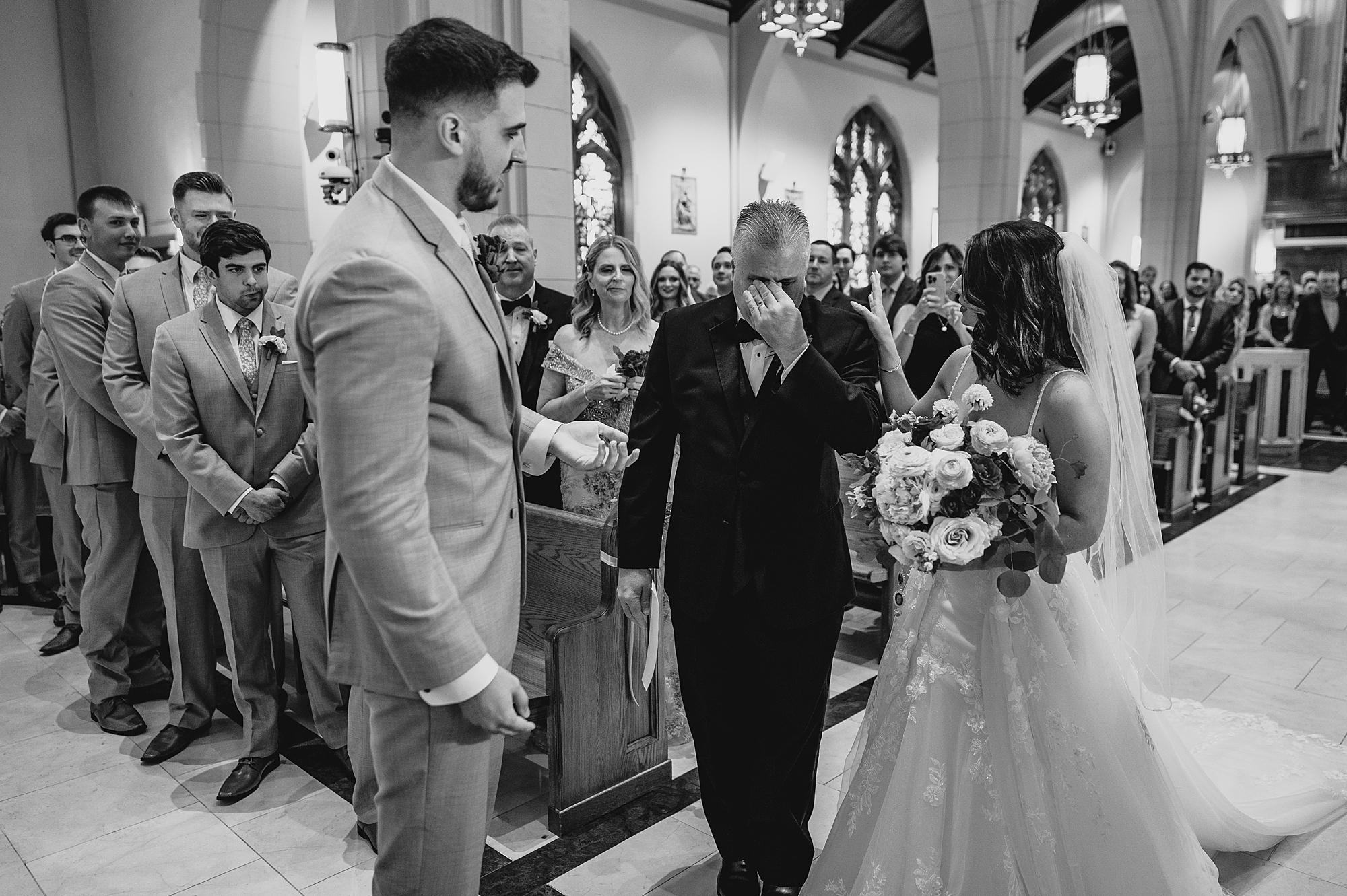 father cries giving away bride during traditional church ceremony in New Jersey