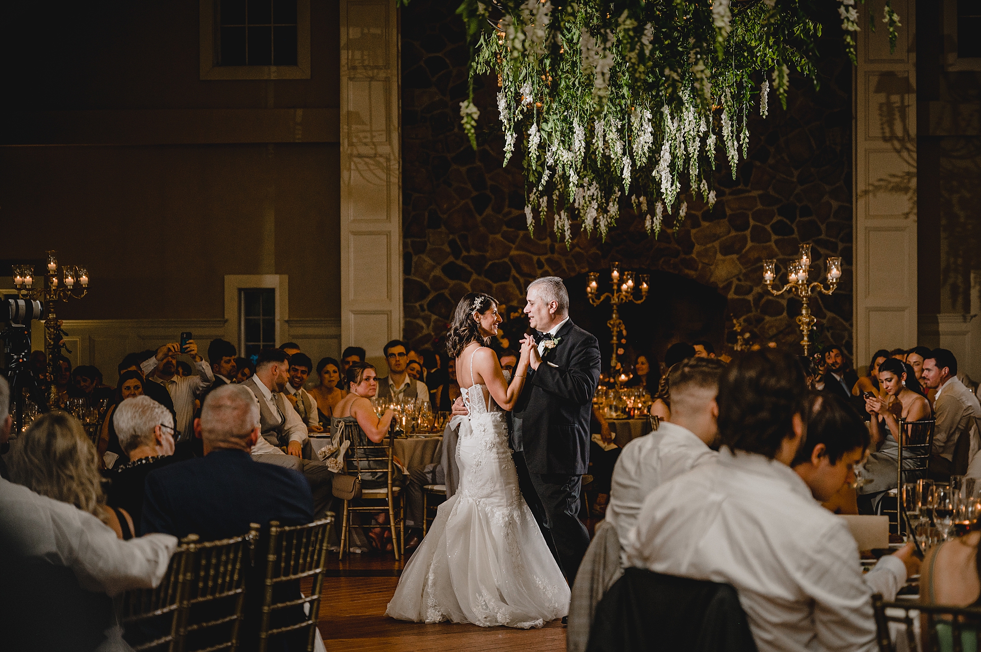 bride and dad dance together during wedding reception at the Ryland Inn
