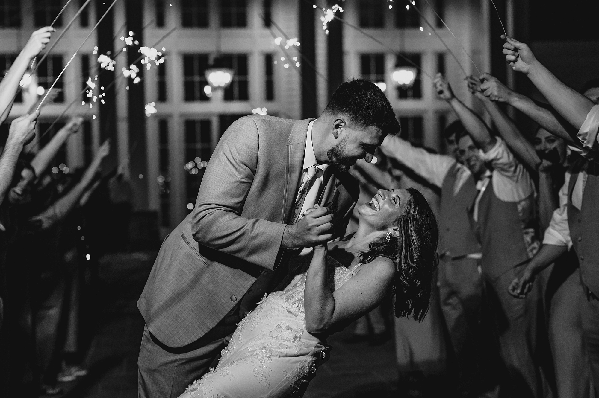 groom dips bride during wedding reception at the Ryland Inn