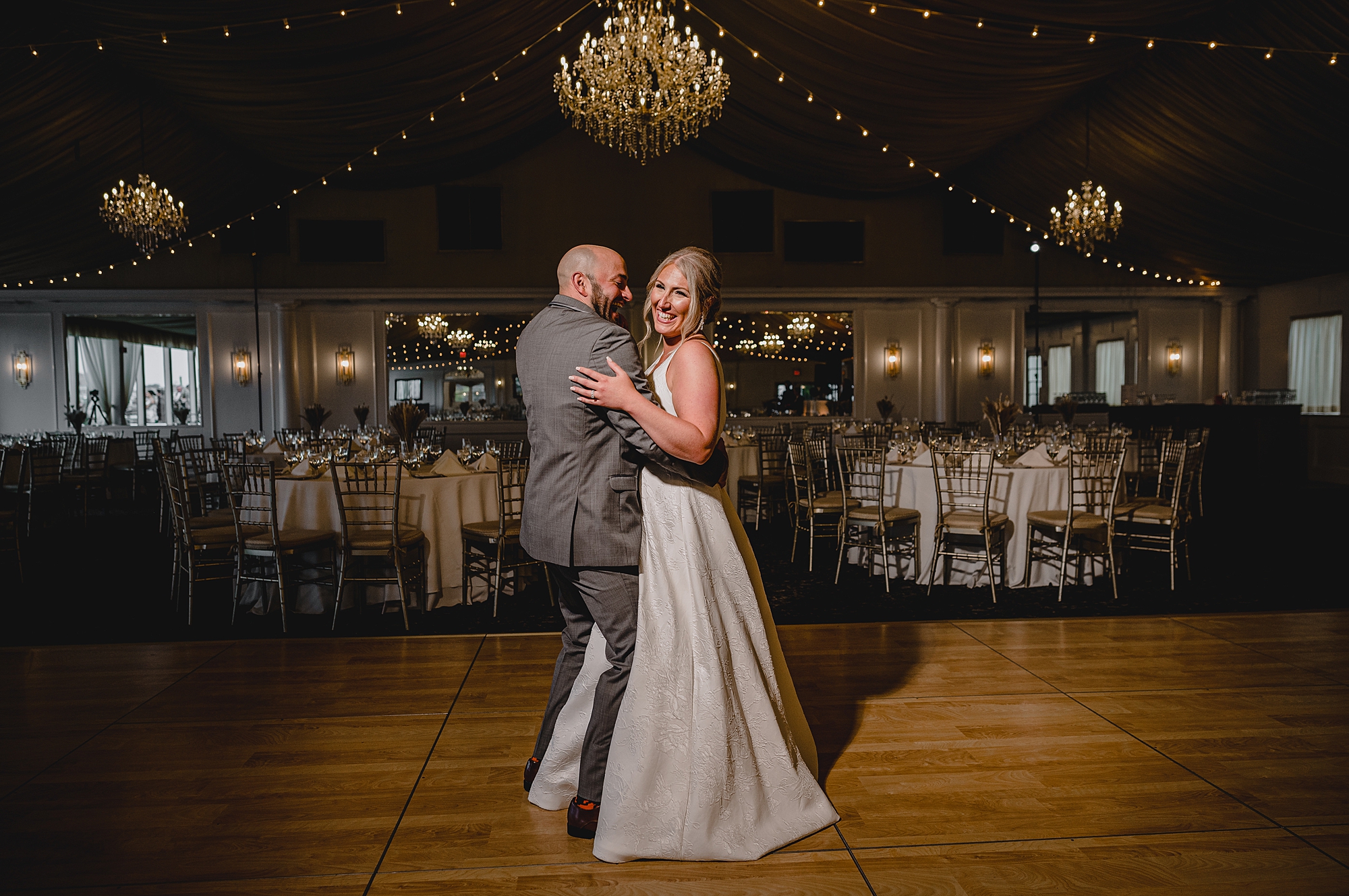 bride and groom have private dance inside Bridgeview Yacht Club