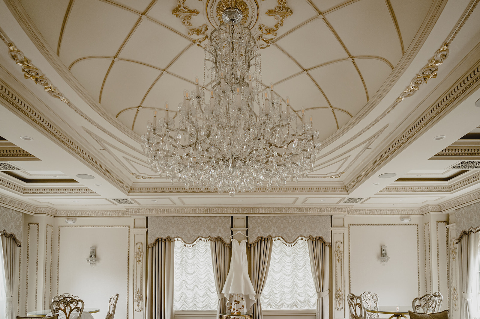 wedding dress hangs inside the ballroom at the Venetian 