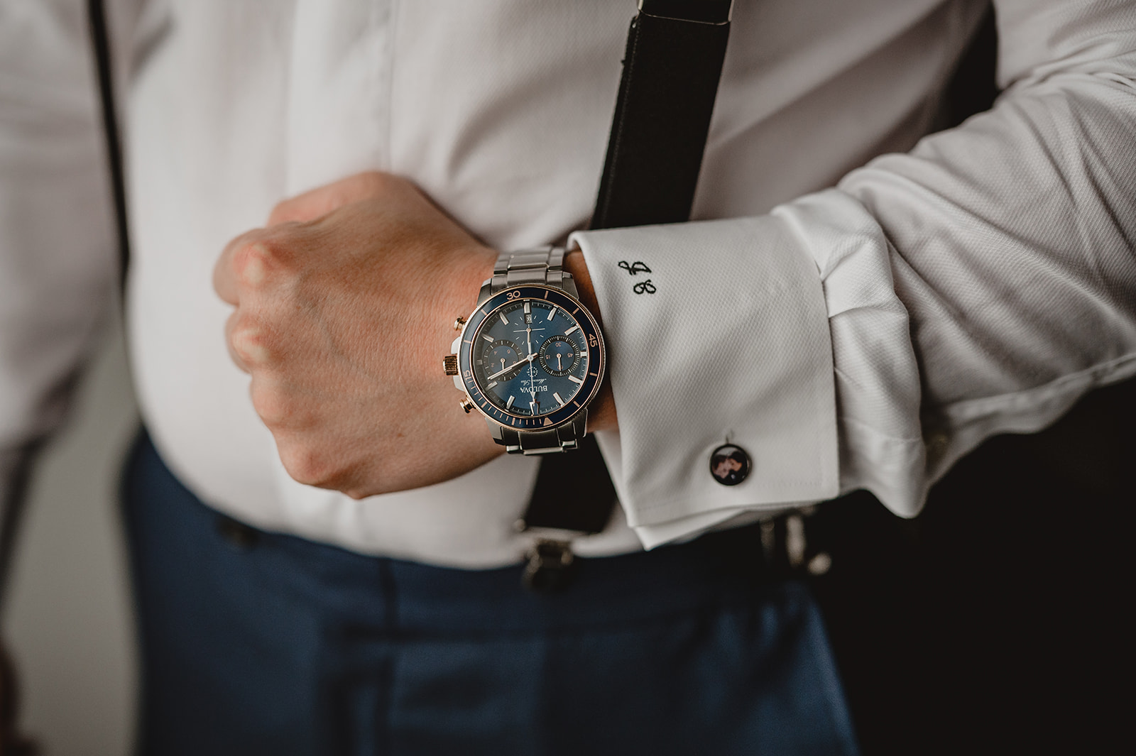 groom shows off new watch on wrist