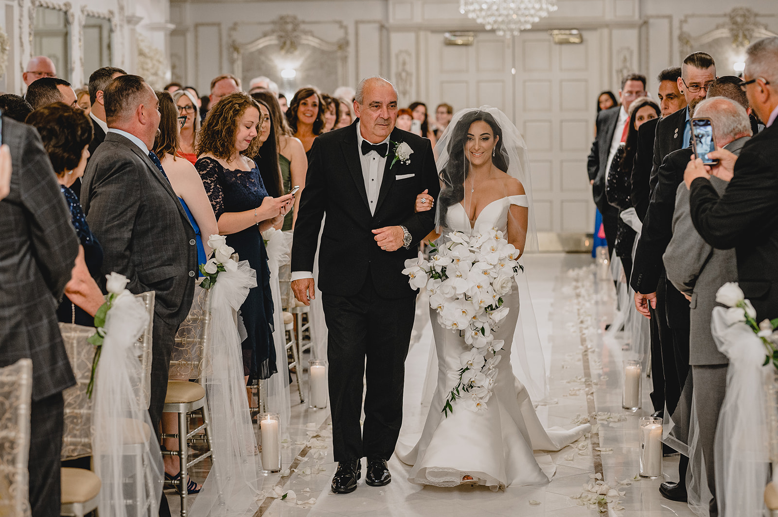 father and bride walk down aisle at the Venetian