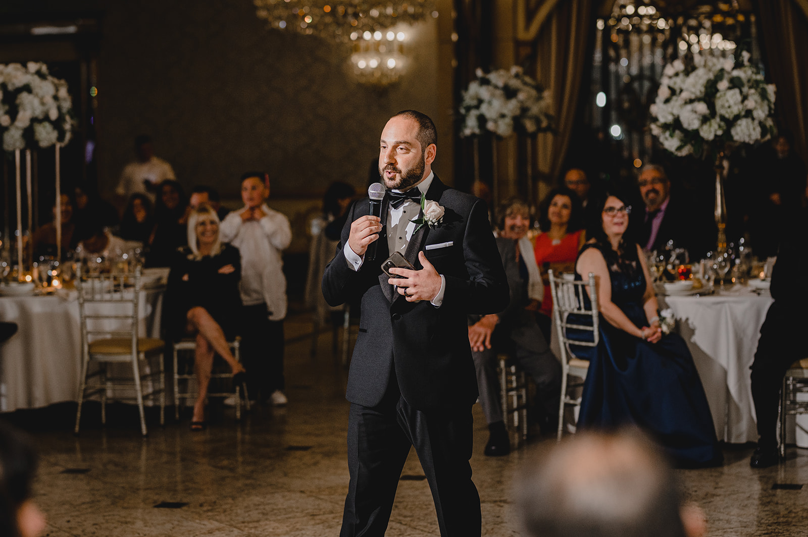 groomsman gives a speech during NJ wedding reception