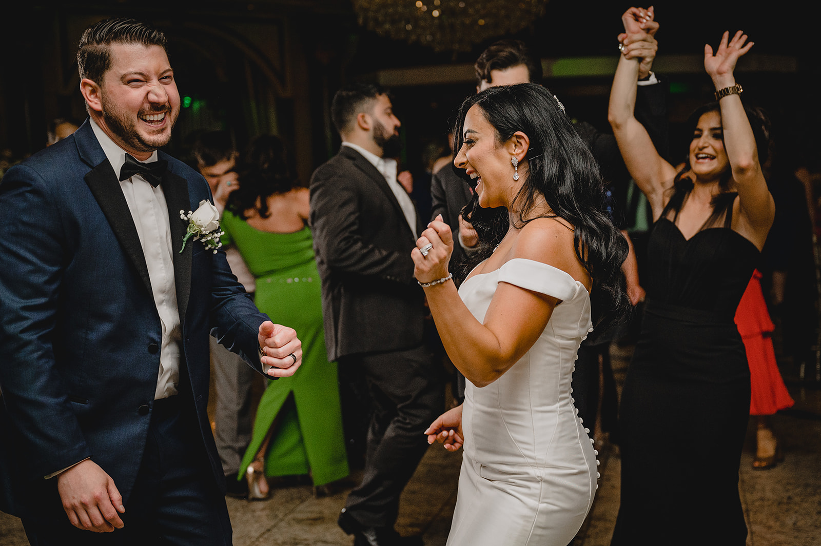 bride dances with guest during NJ wedding reception