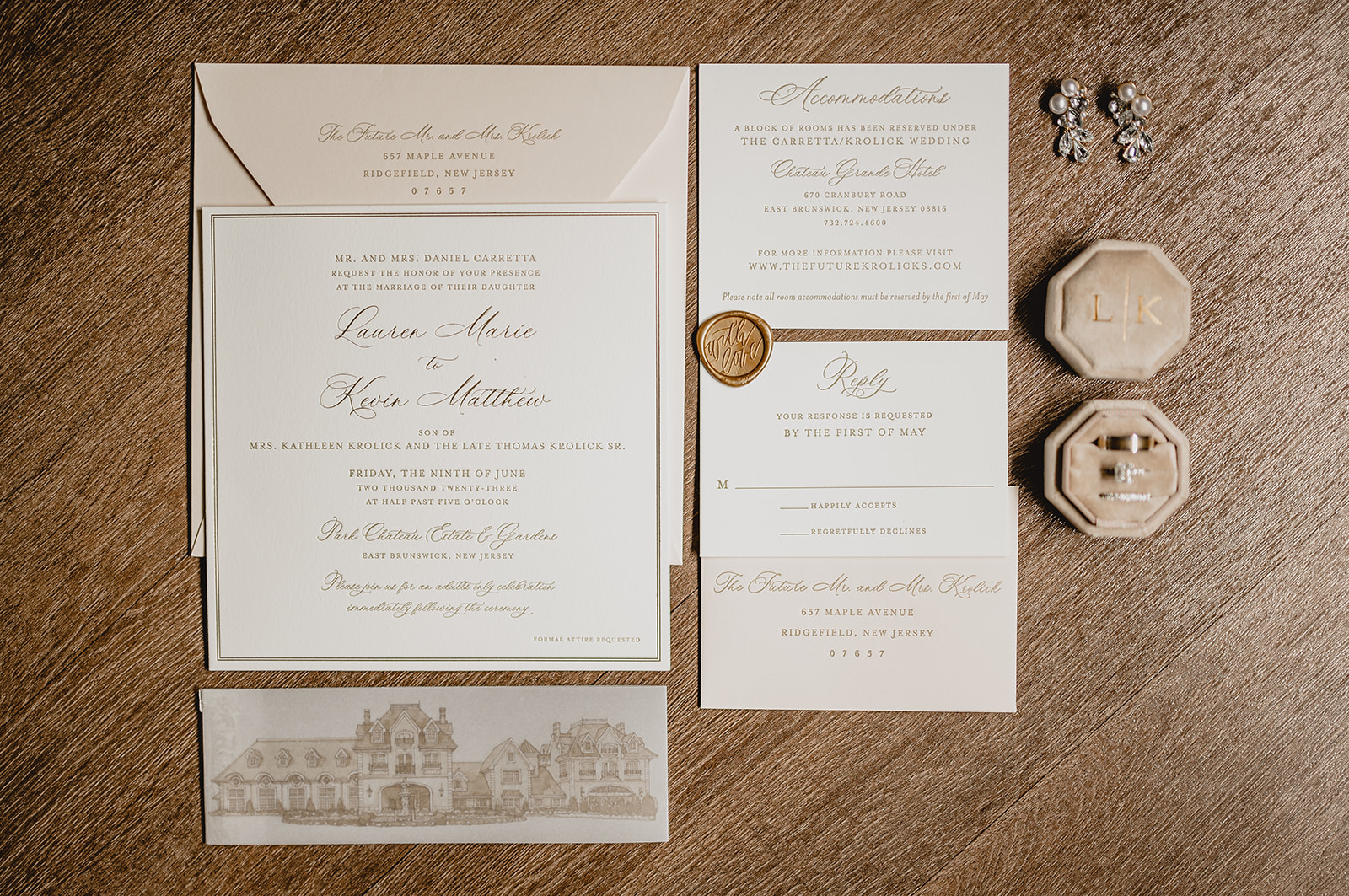 blush and white stationery with gold wax seal