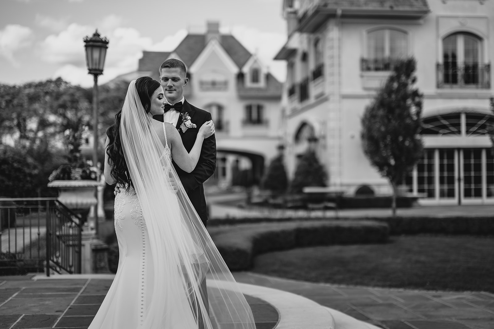 bride and groom dance outside Park Chateau Estate