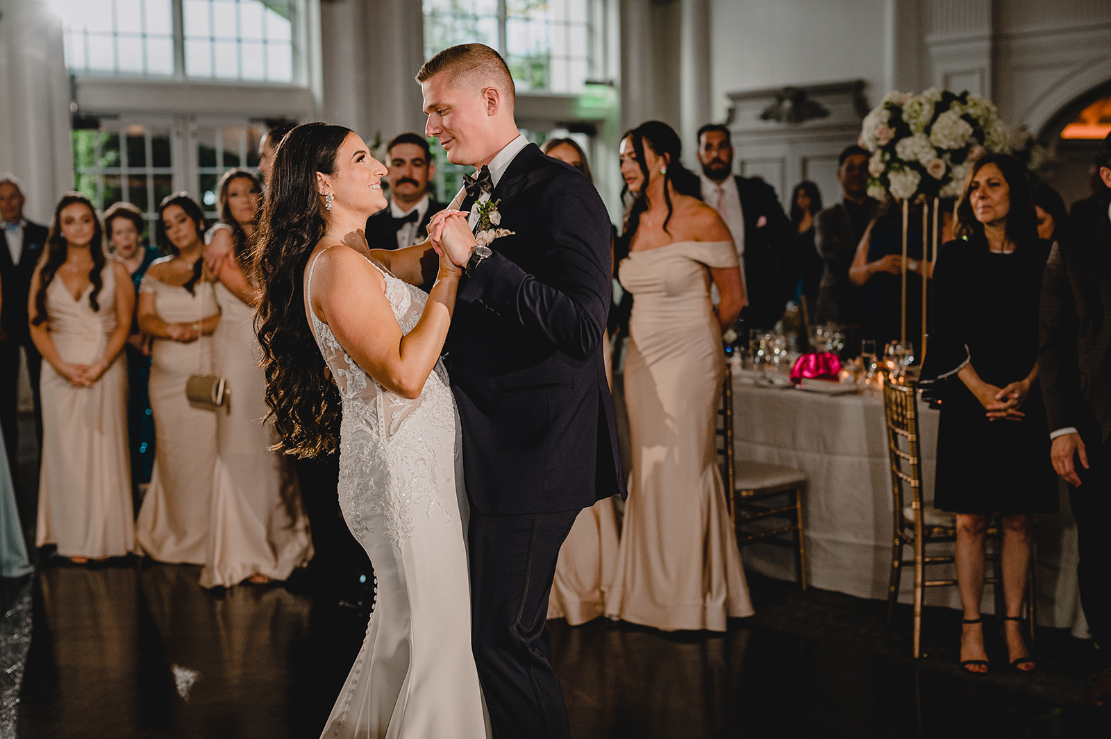 bride and groom dance together during reception