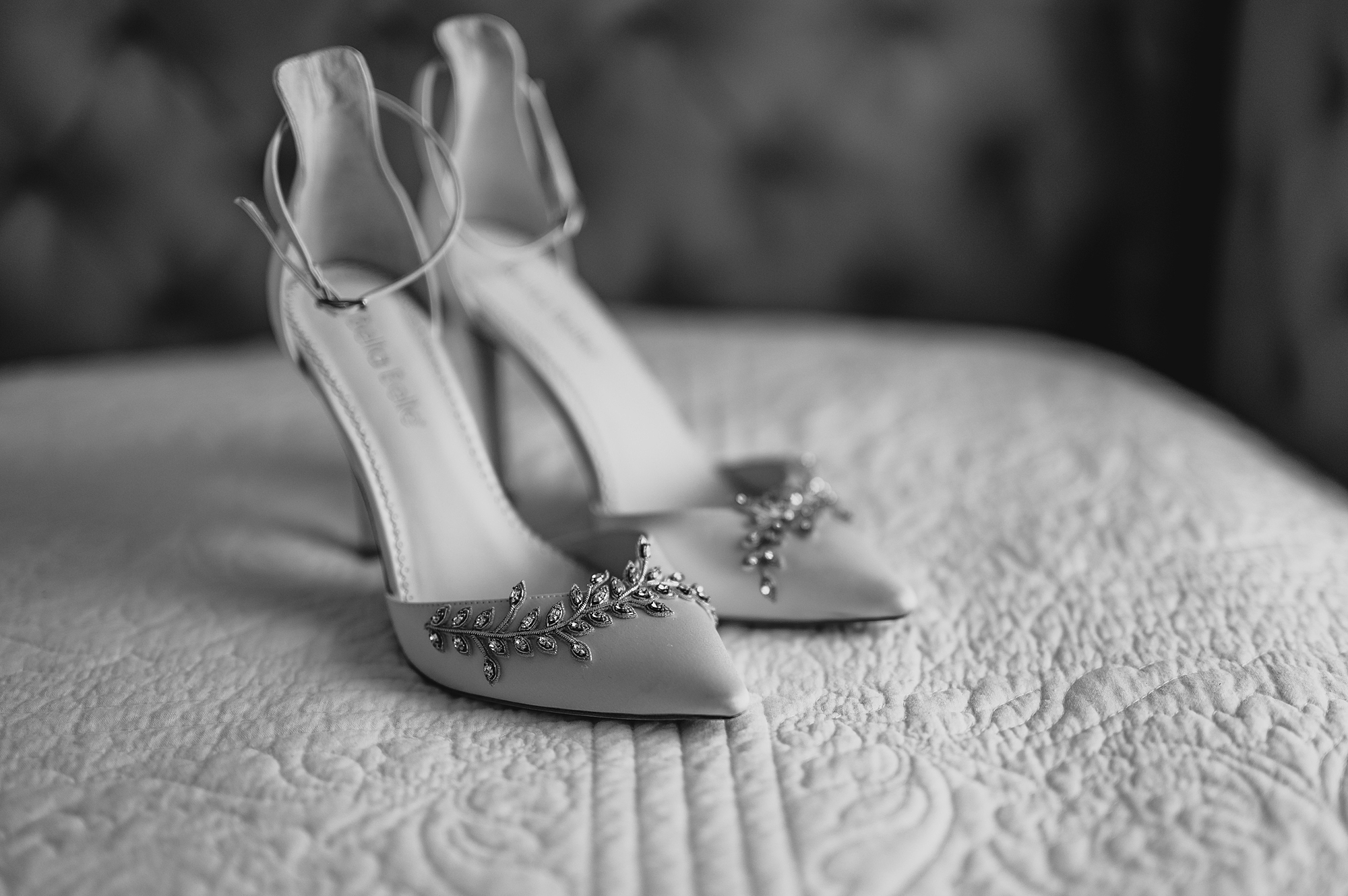 bride's heels with jewels on the toe