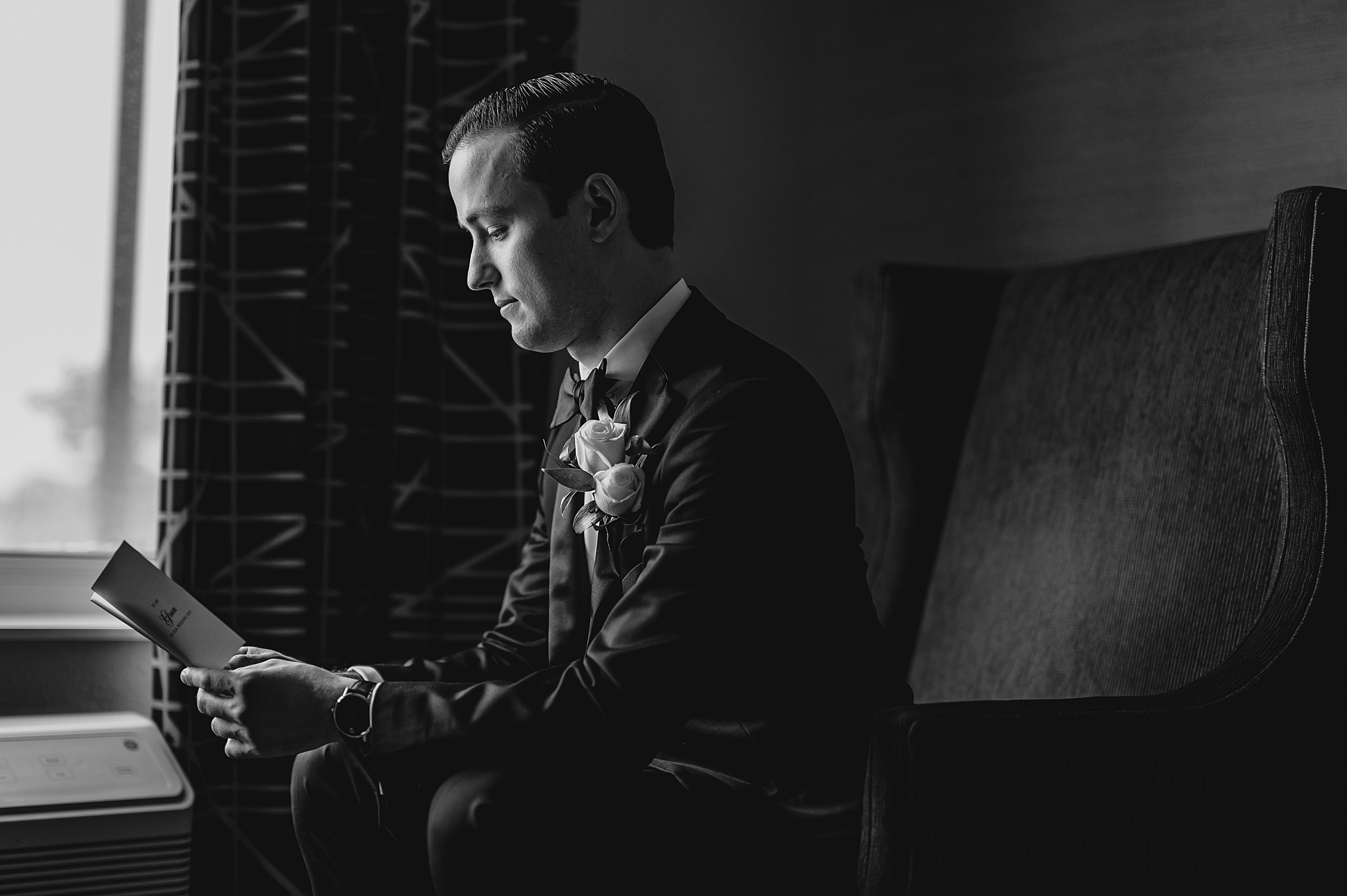 groom reads letter on wedding morning on Long Island 