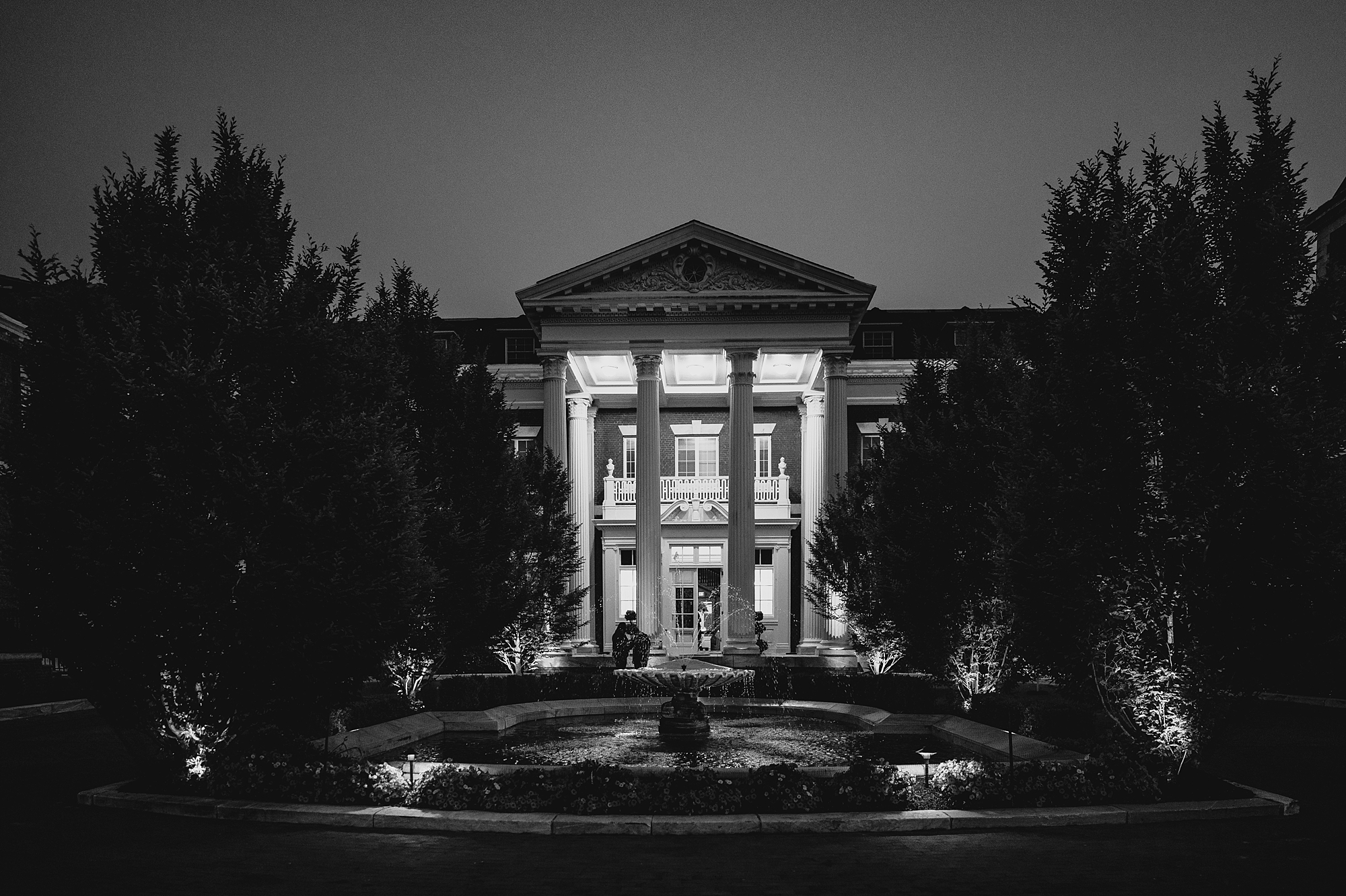 nighttime photo of Bourne Mansion in Long Island NY
