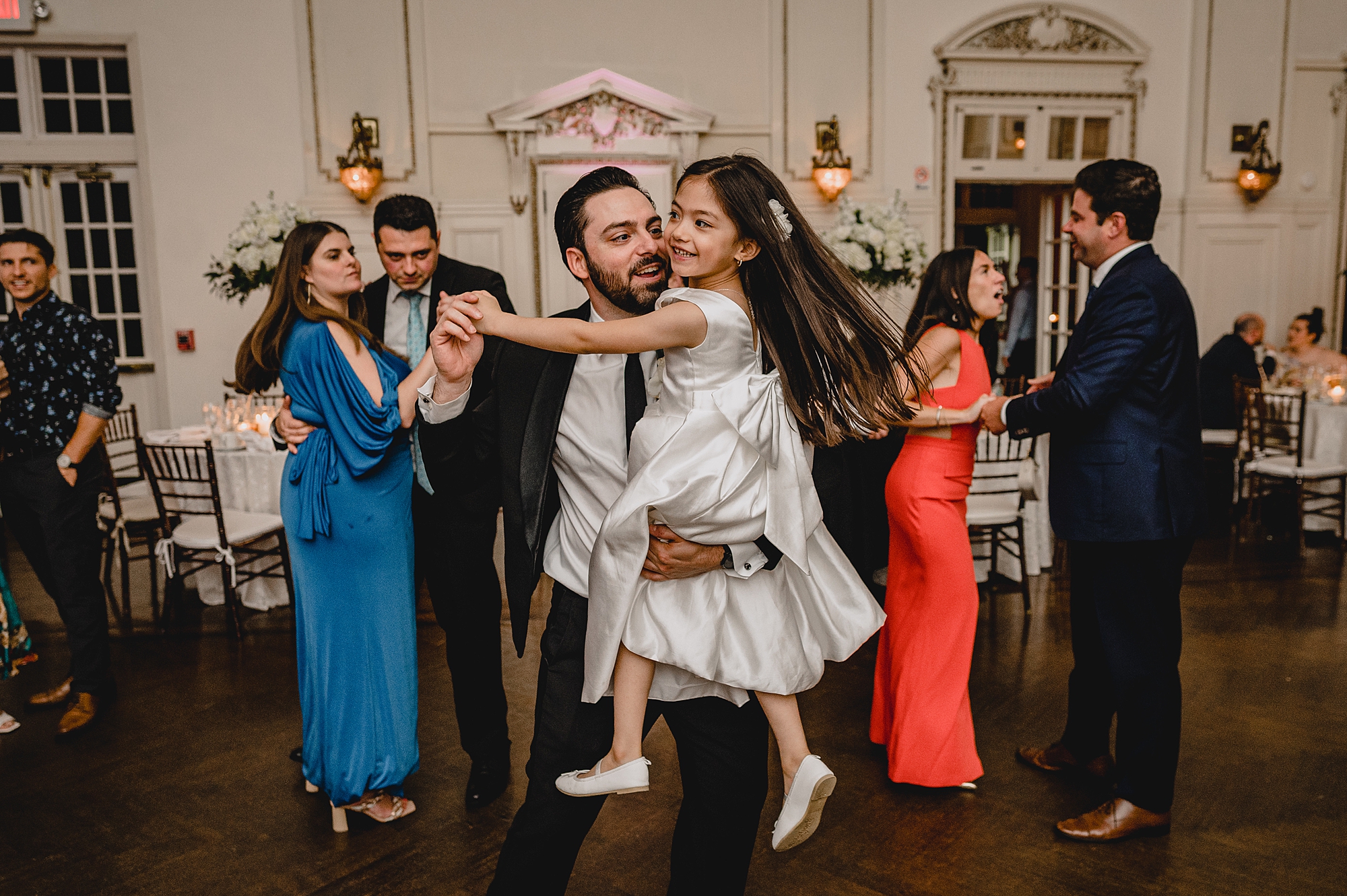 wedding guests dance during Long Island reception 