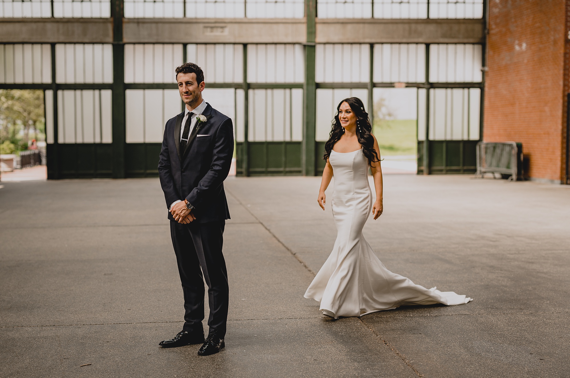 bride walks to reach groom for first look at New Jersey hotel