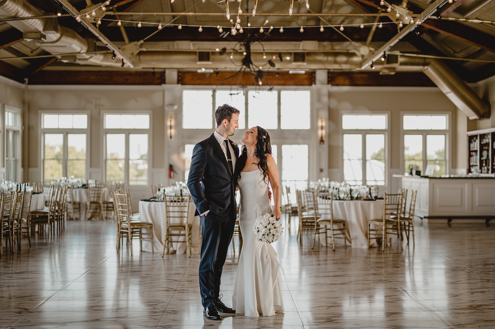 bride and groom dance in ballroom at the Liberty House