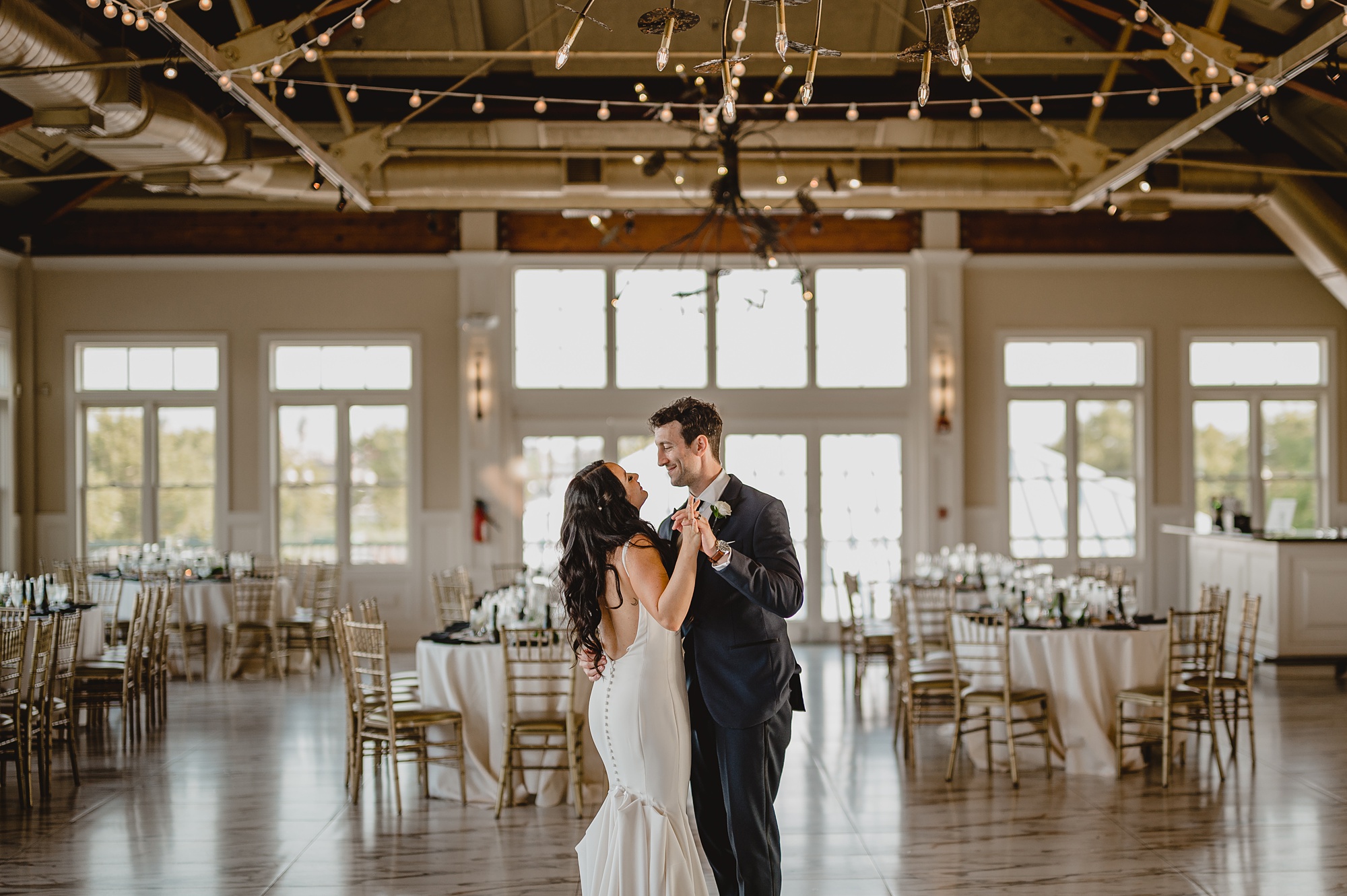 bride and groom dance in ballroom at the Liberty House