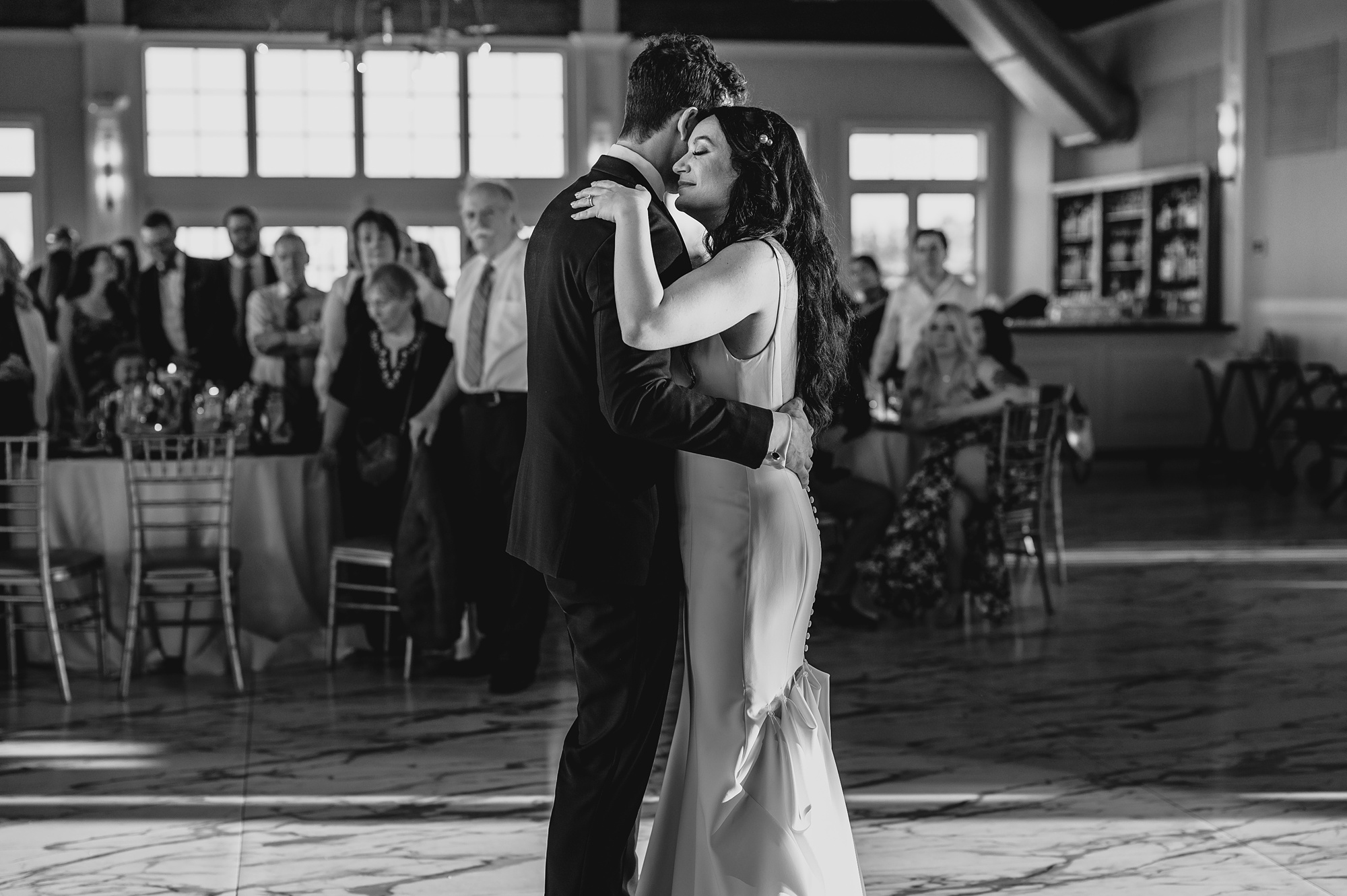 newlyweds dance together during reception at the Liberty House