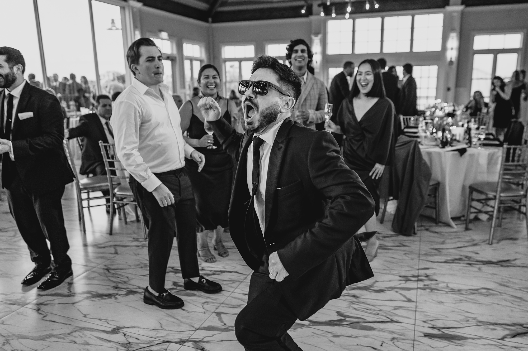 wedding guests dance during reception at the Liberty House