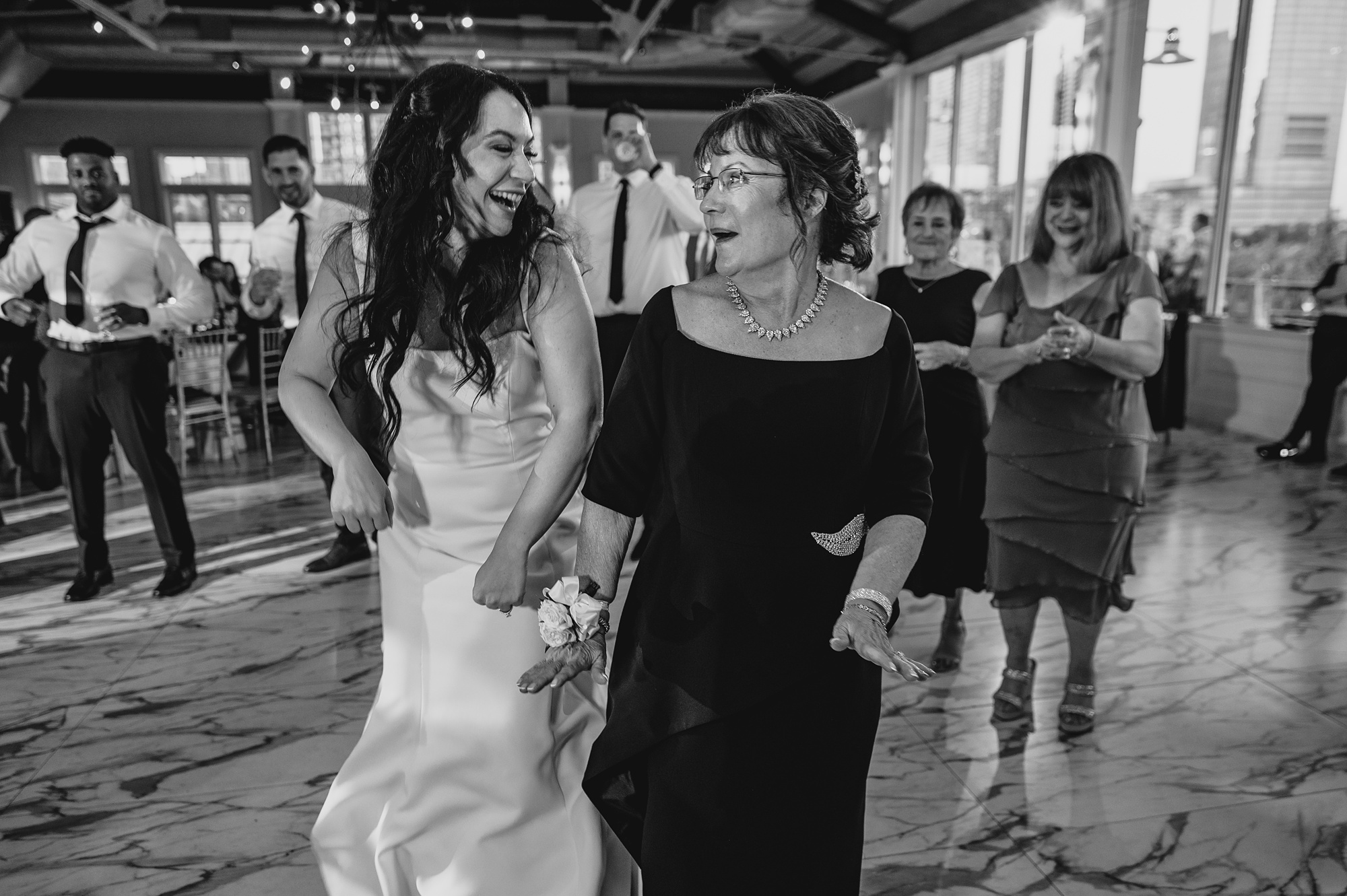 wedding guests dance during reception at the Liberty House
