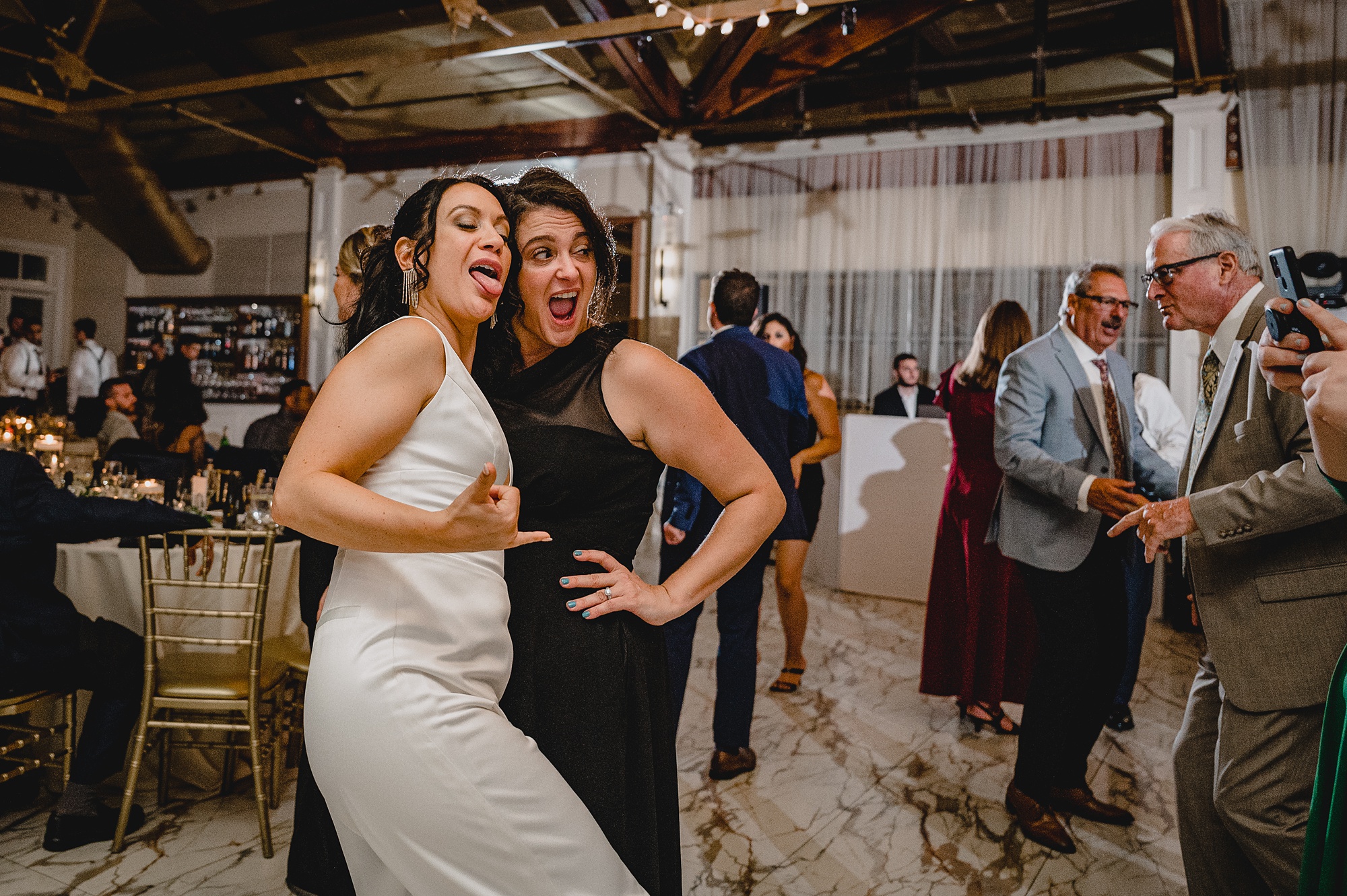 wedding guests dance during reception at the Liberty House