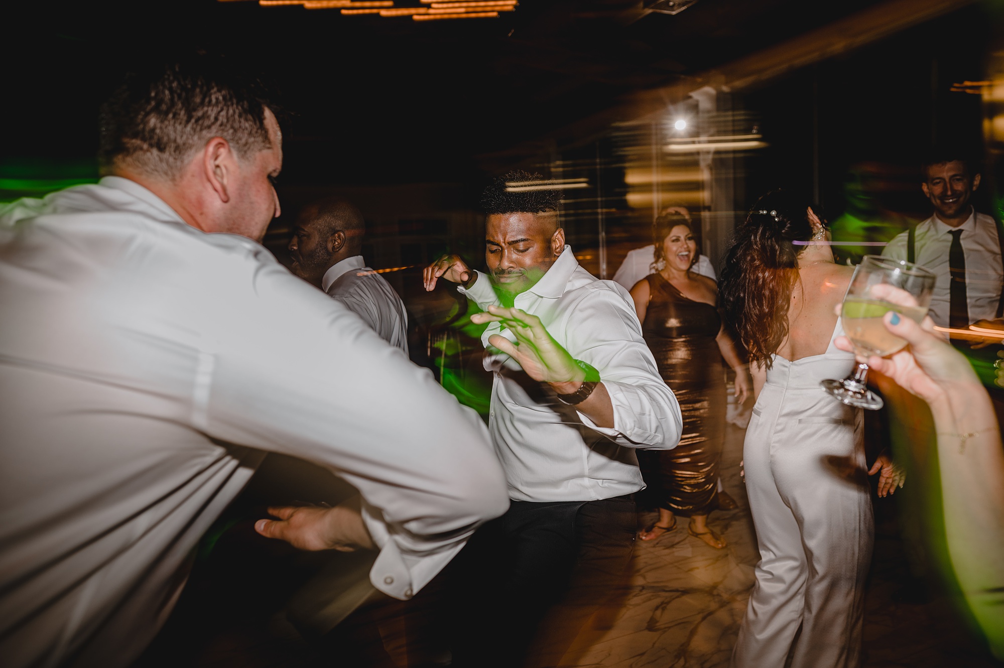 wedding guests dance during reception at the Liberty House