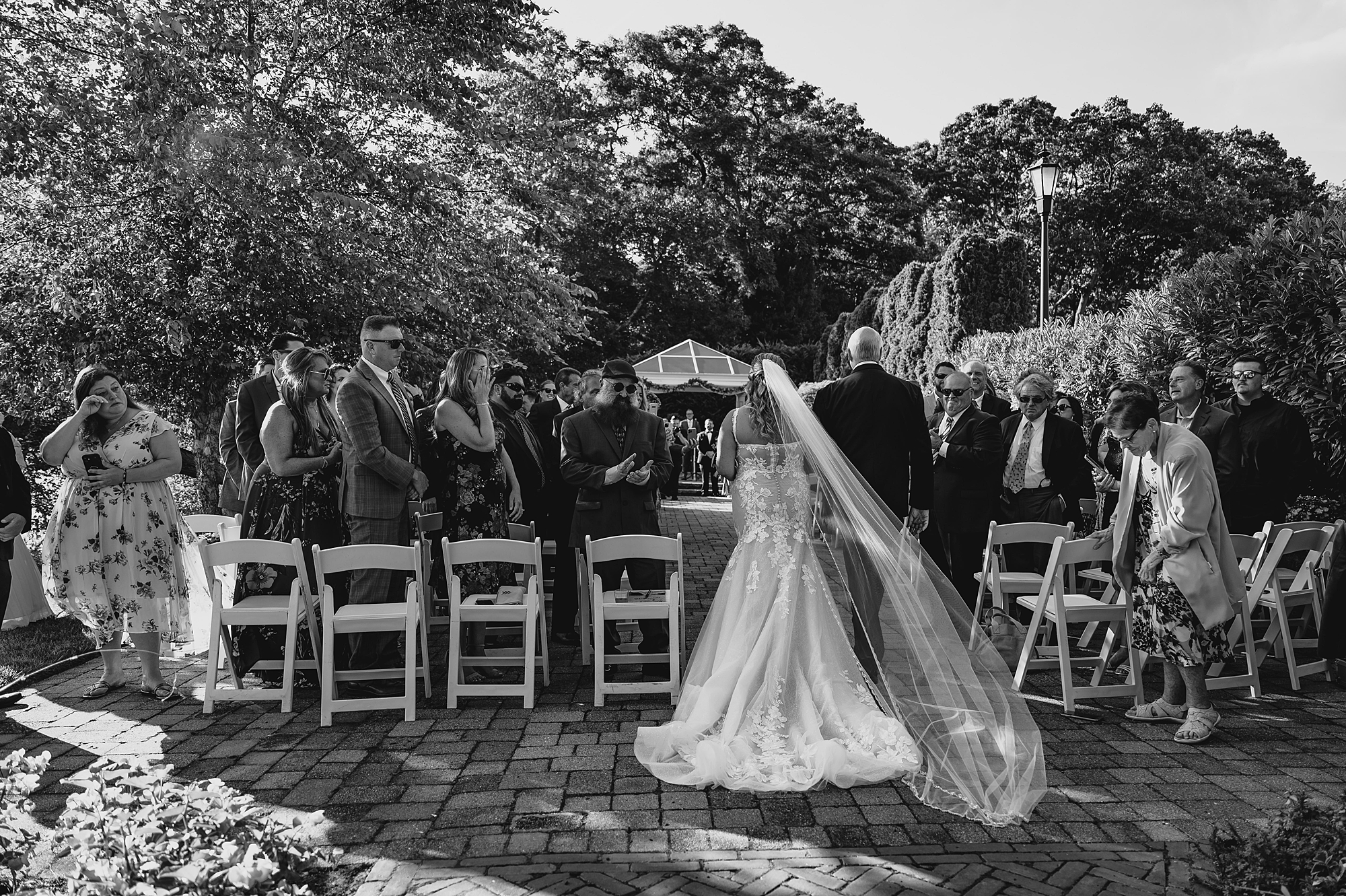 father escorts bride down the aisle for ceremony at the Mill Lakeside Manor