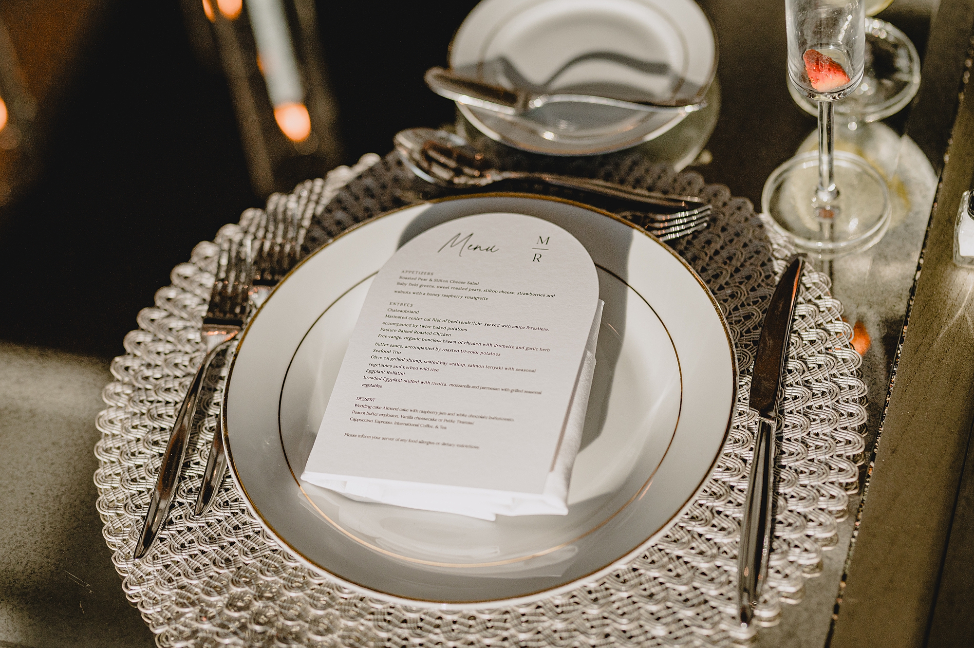 place setting with menu card and silver napkins on table at the Mill Lakeside Manor
