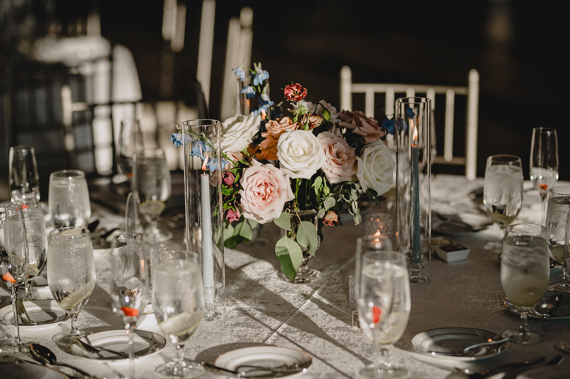 wedding reception centerpieces with pink and red flowers