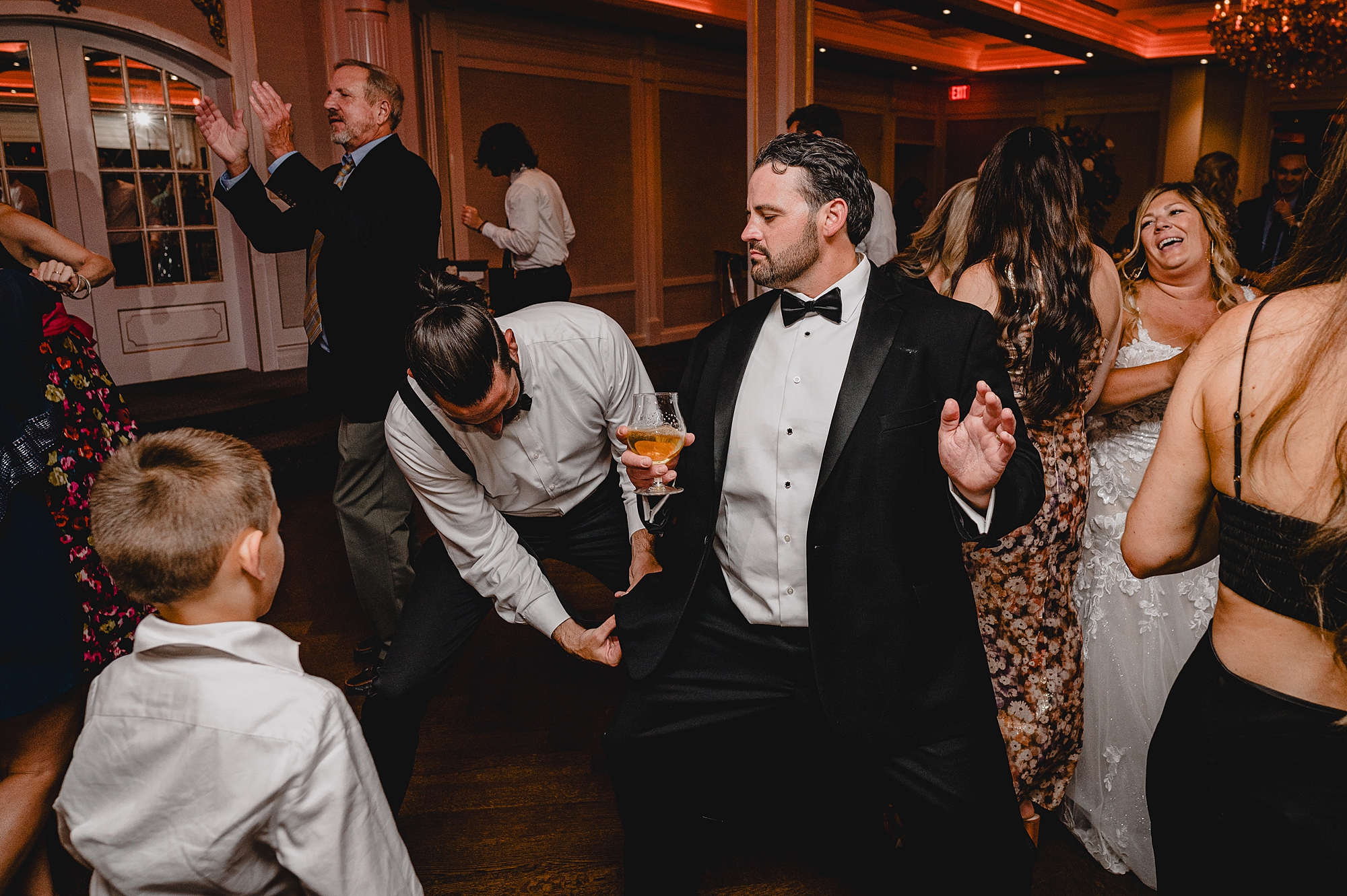 groom dances during Spring Lake NJ wedding reception