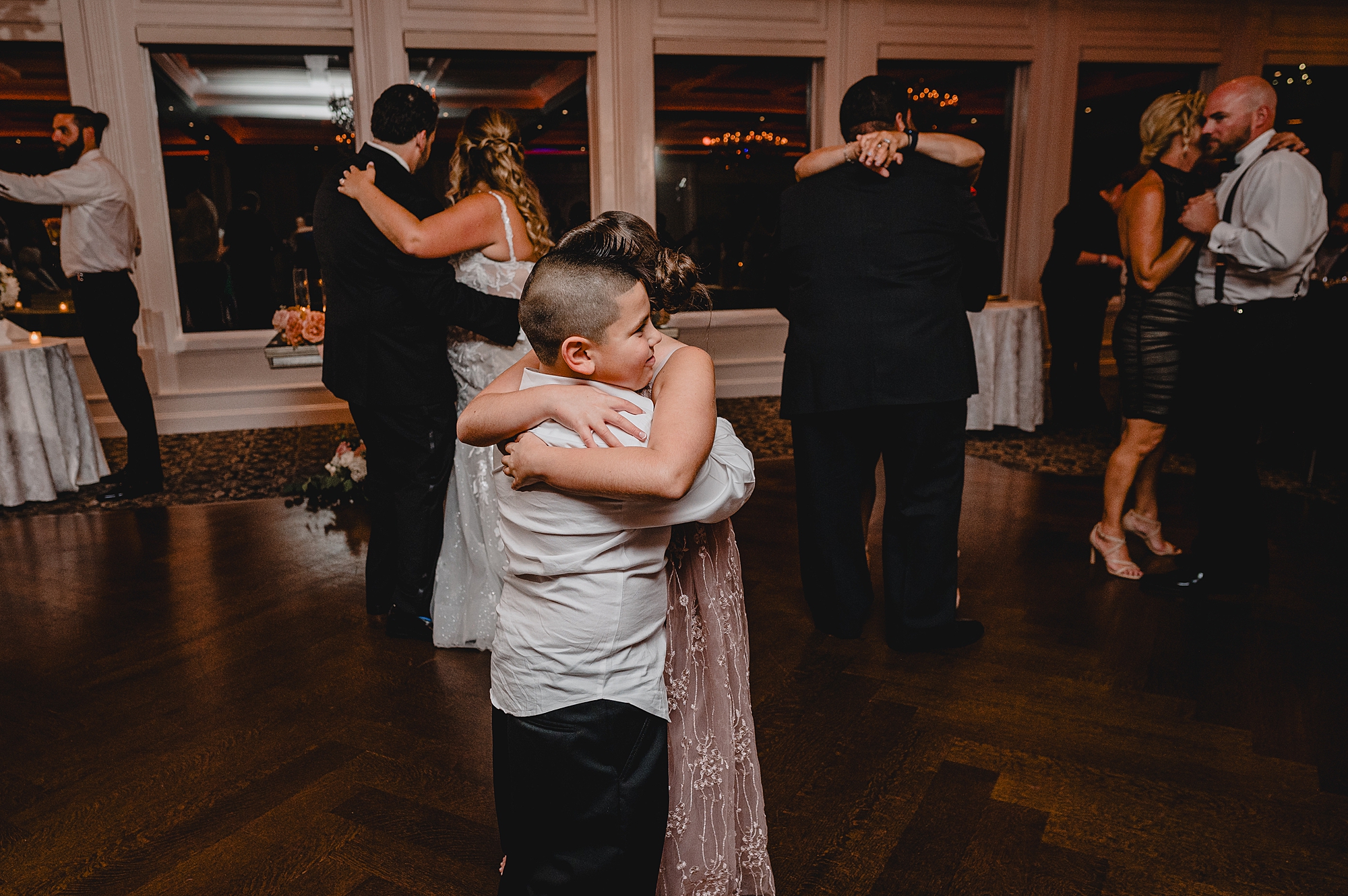 kids hug on dance floor at Spring Lake NJ wedding reception