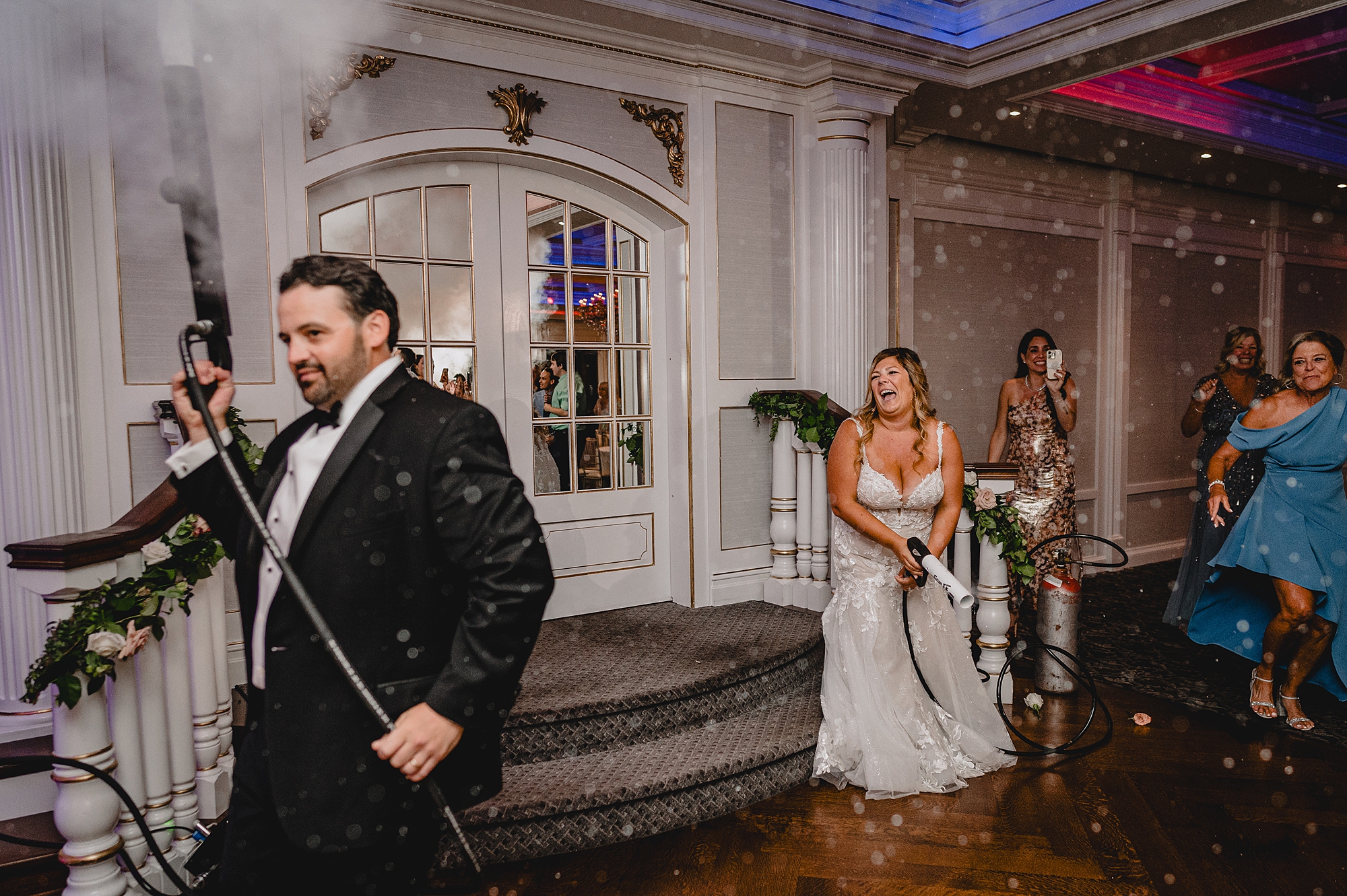 bride and groom use fog machines during Spring Lake NJ wedding reception