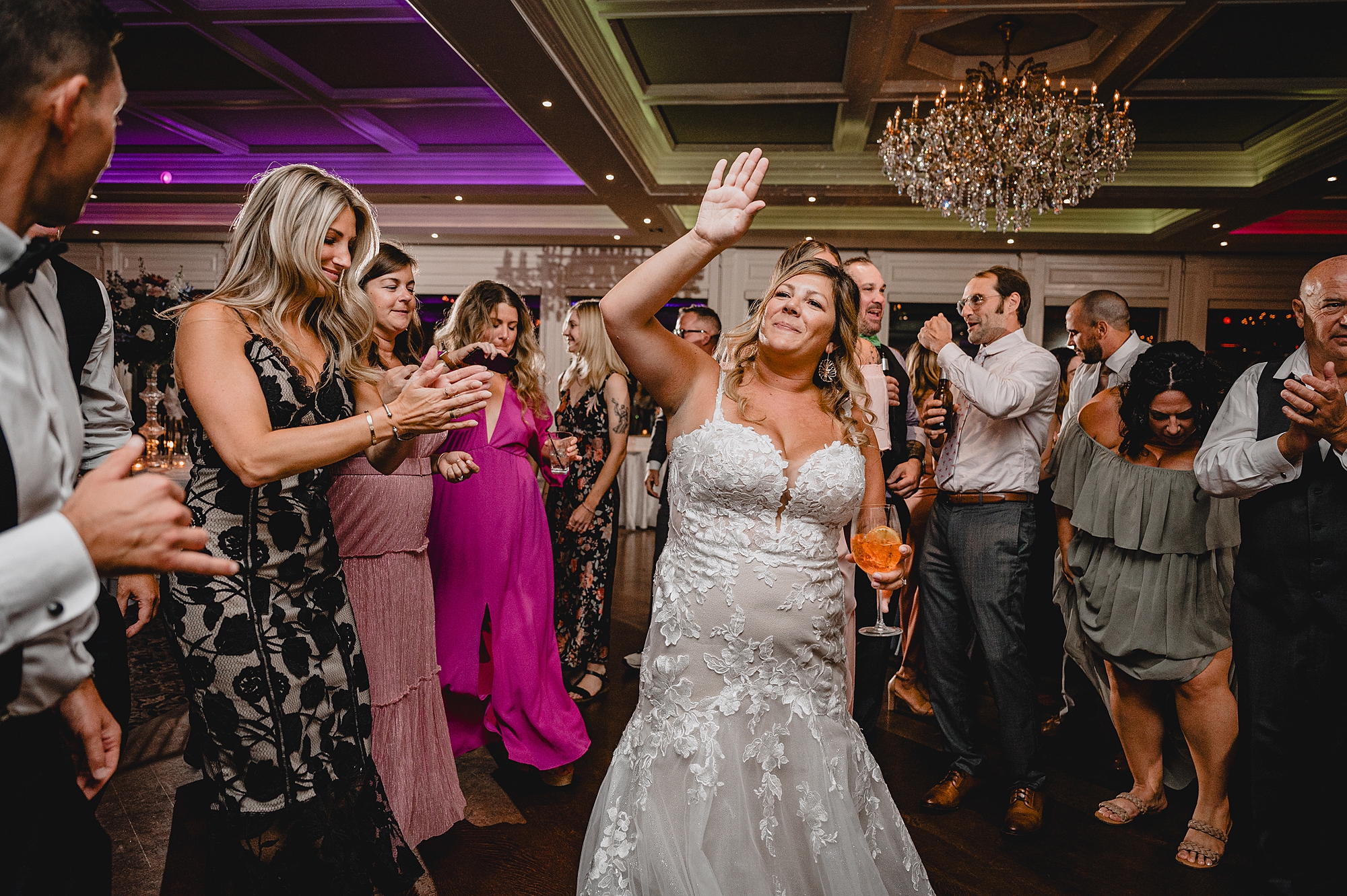 bride dances with guests during Spring Lake NJ wedding reception