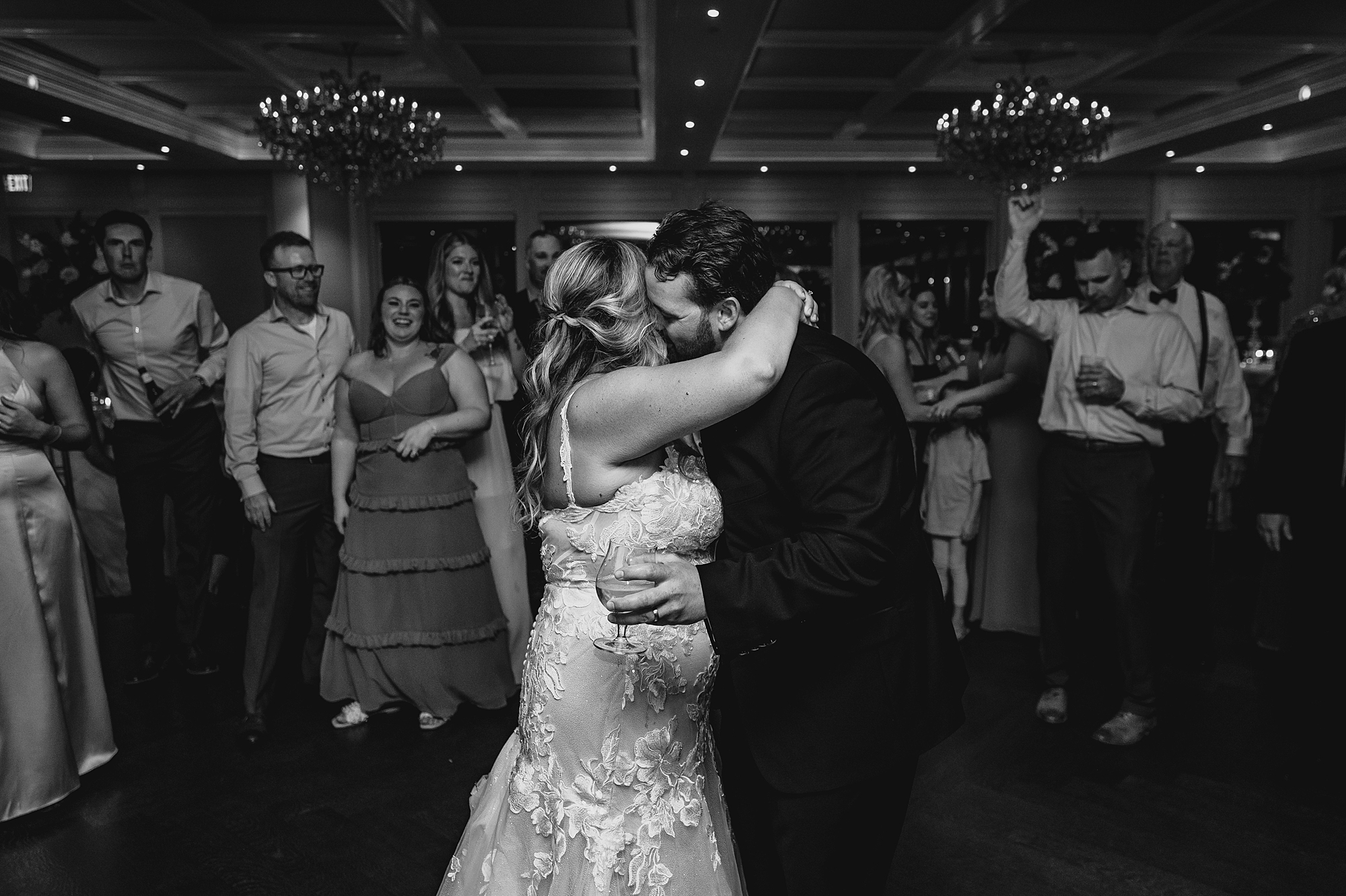bride and groom kiss on dance floor during Spring Lake NJ wedding reception
