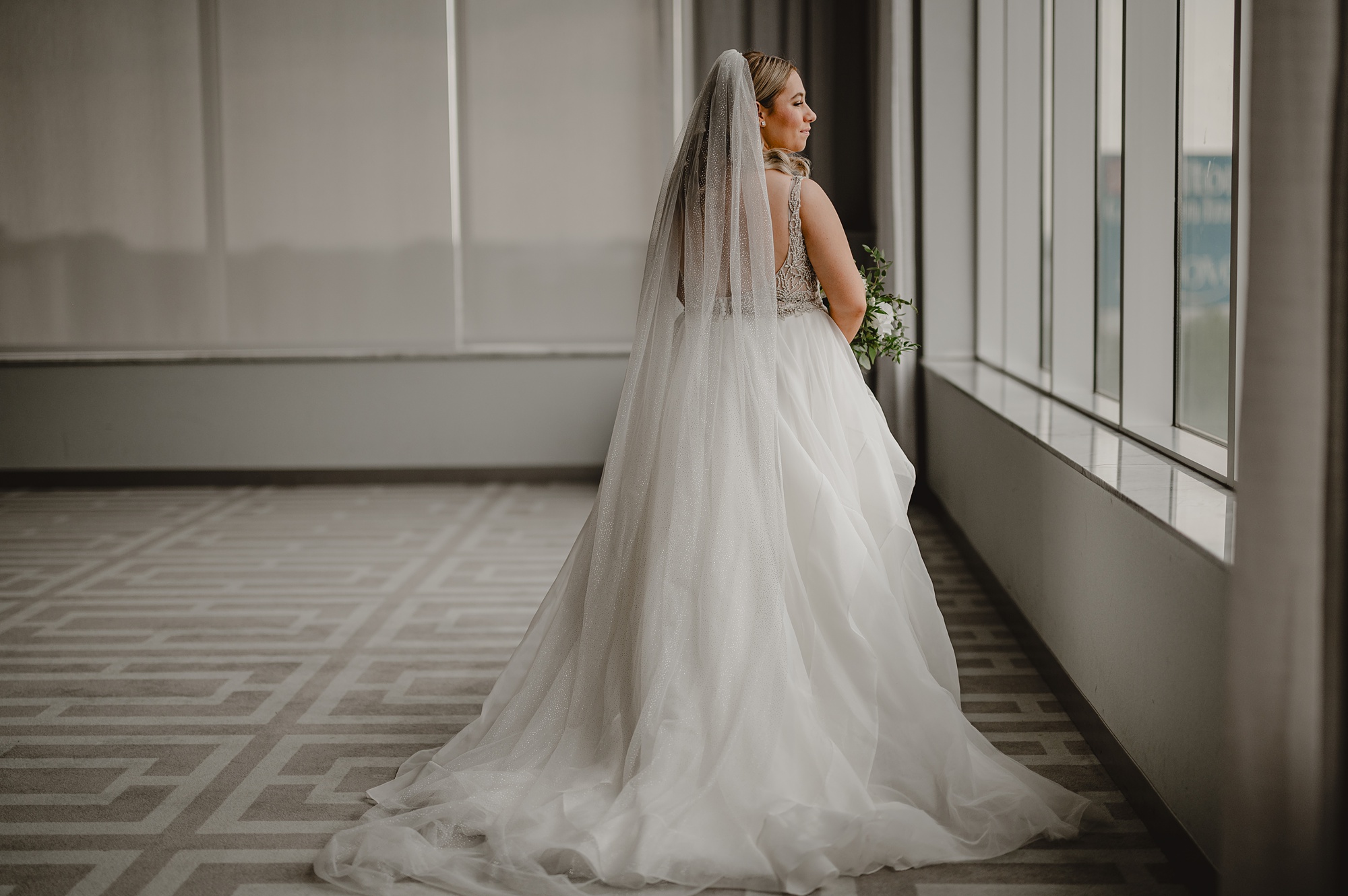 bridal portrait in windows of Above Staten Island