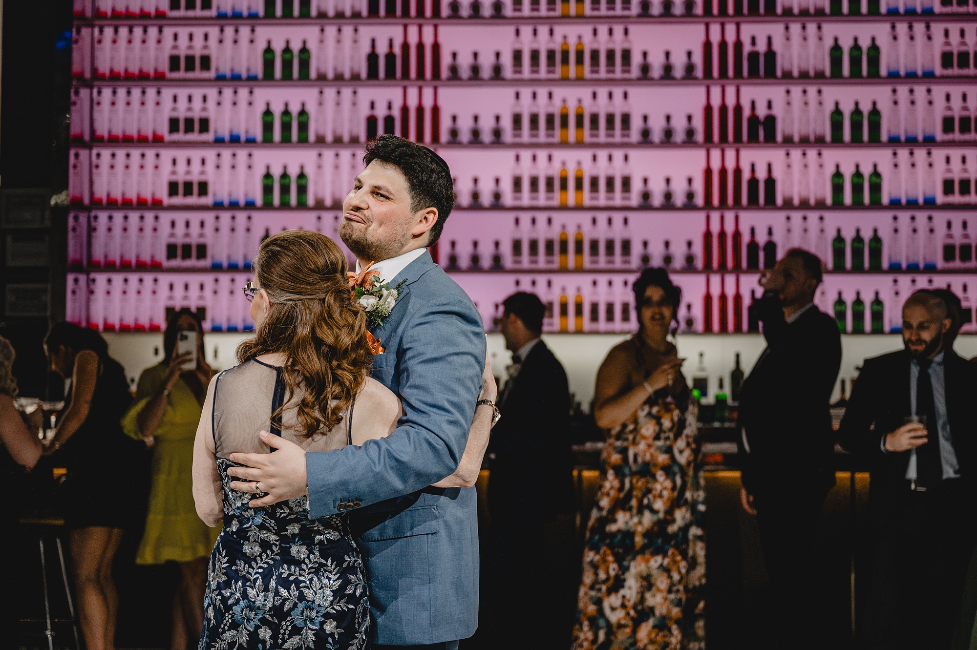 groom dances with mother during reception at Above Staten Island