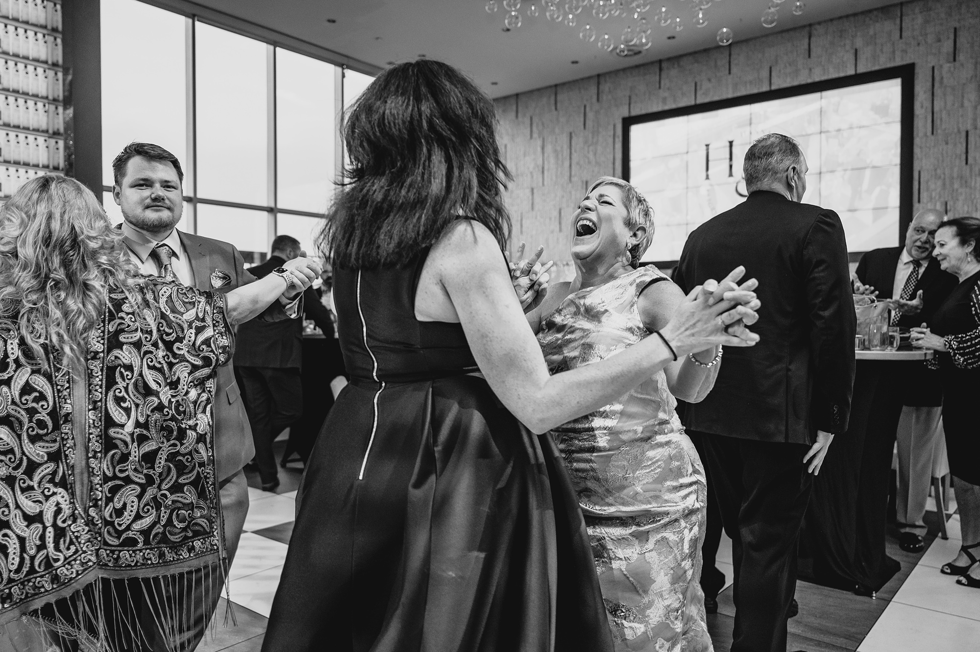 wedding guests dance during Staten Island wedding reception