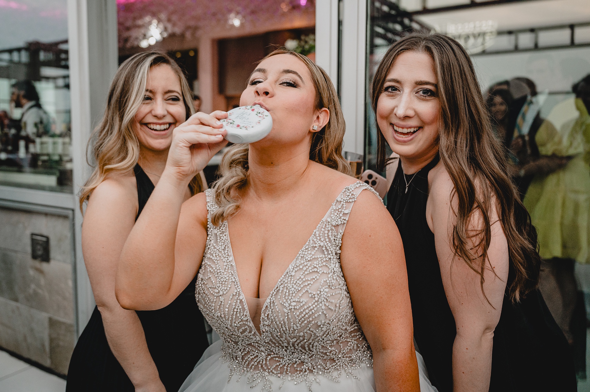 bride eats custom cookie during NY reception