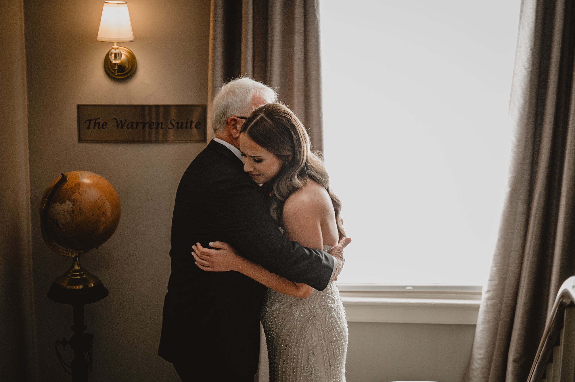 bride hugs father during first look at David's Country Inn