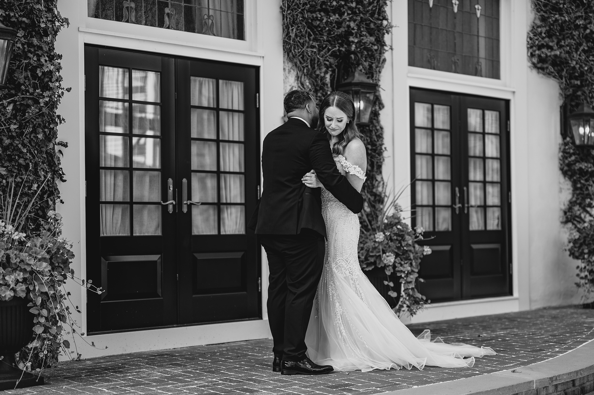 newlyweds hug during first look in New Jersey