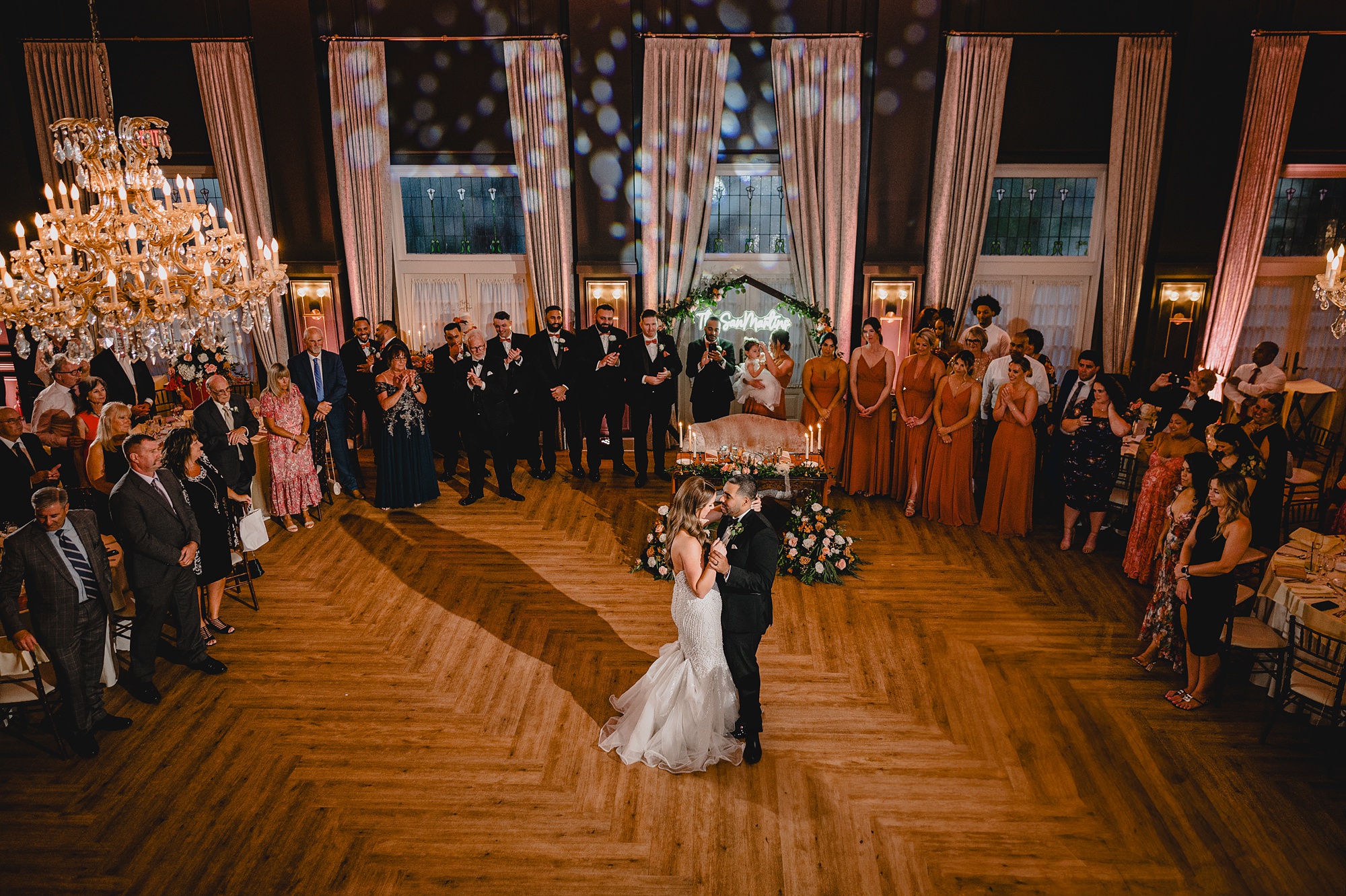 newlyweds dance together in ballroom of David's Country Inn