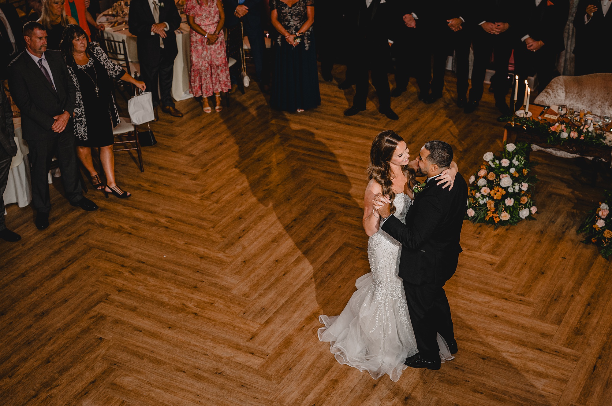 newlyweds hug during first dance at David's Country Inn