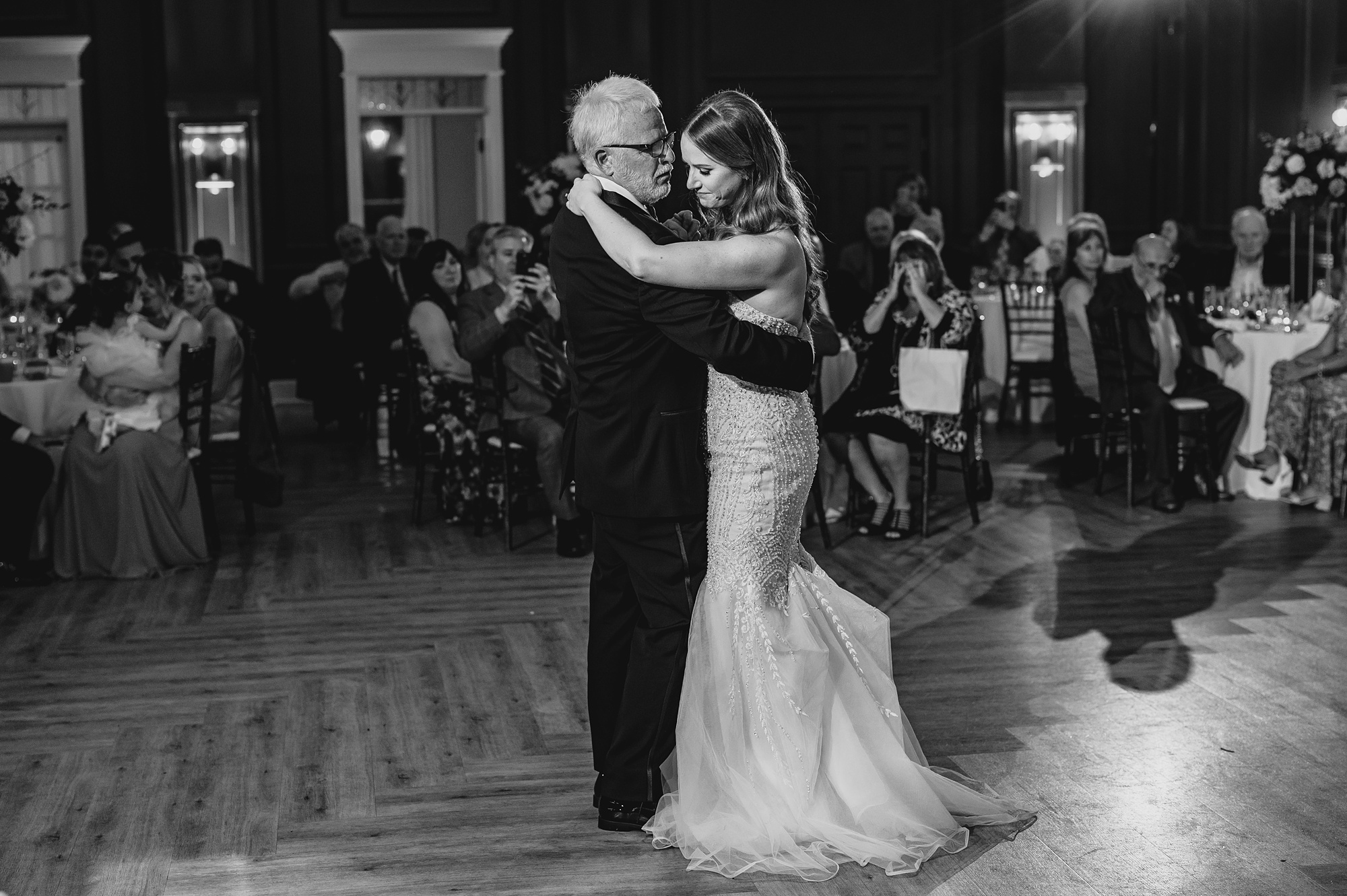 bride and father dance during wedding reception