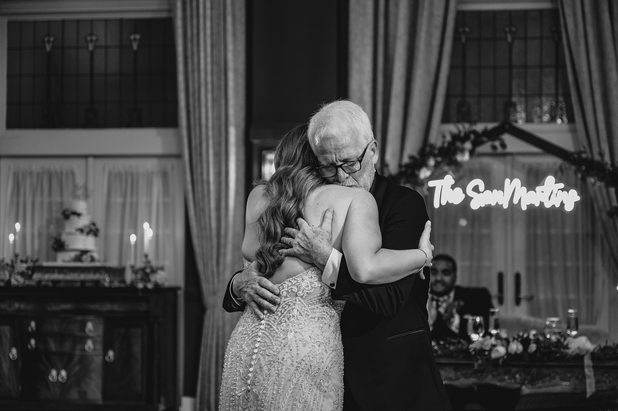 dad hugs bride during reception dance at David's Country Inn