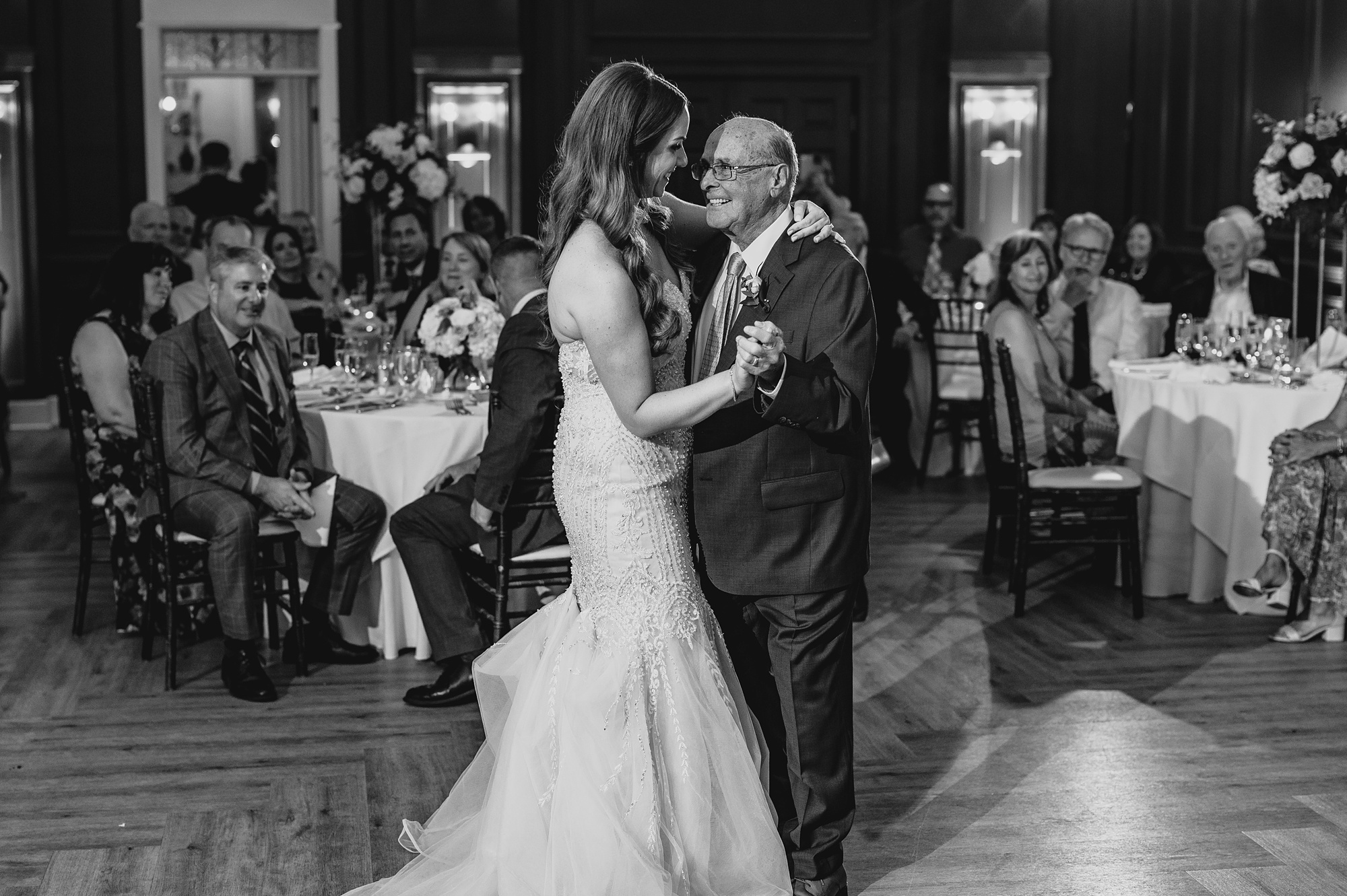 bride dances with grandfather during reception at David's Country Inn