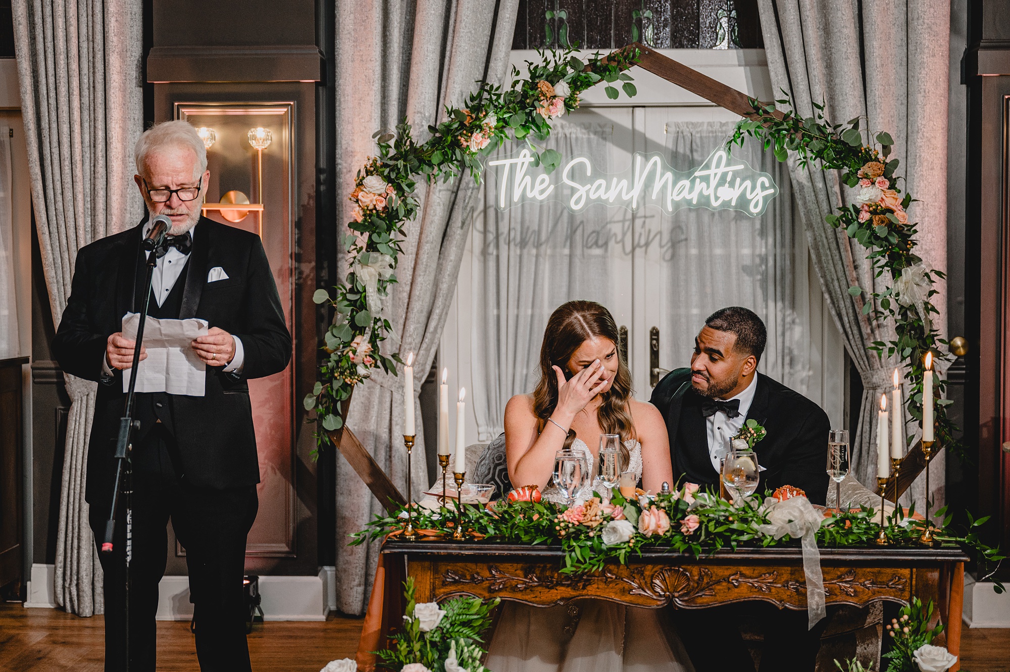 bride and groom listen to toasts during Hackettstown NJ wedding reception