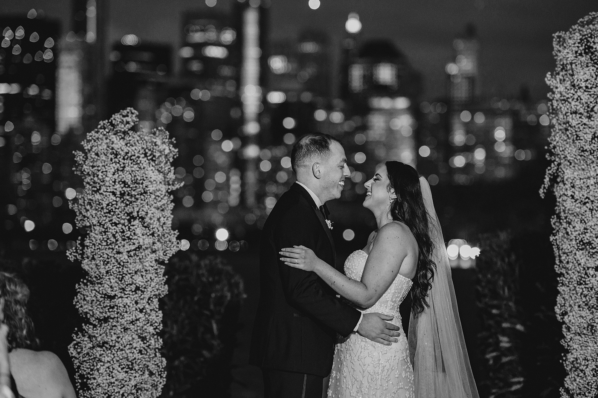 bride and groom kiss during wedding ceremony at the Liberty House