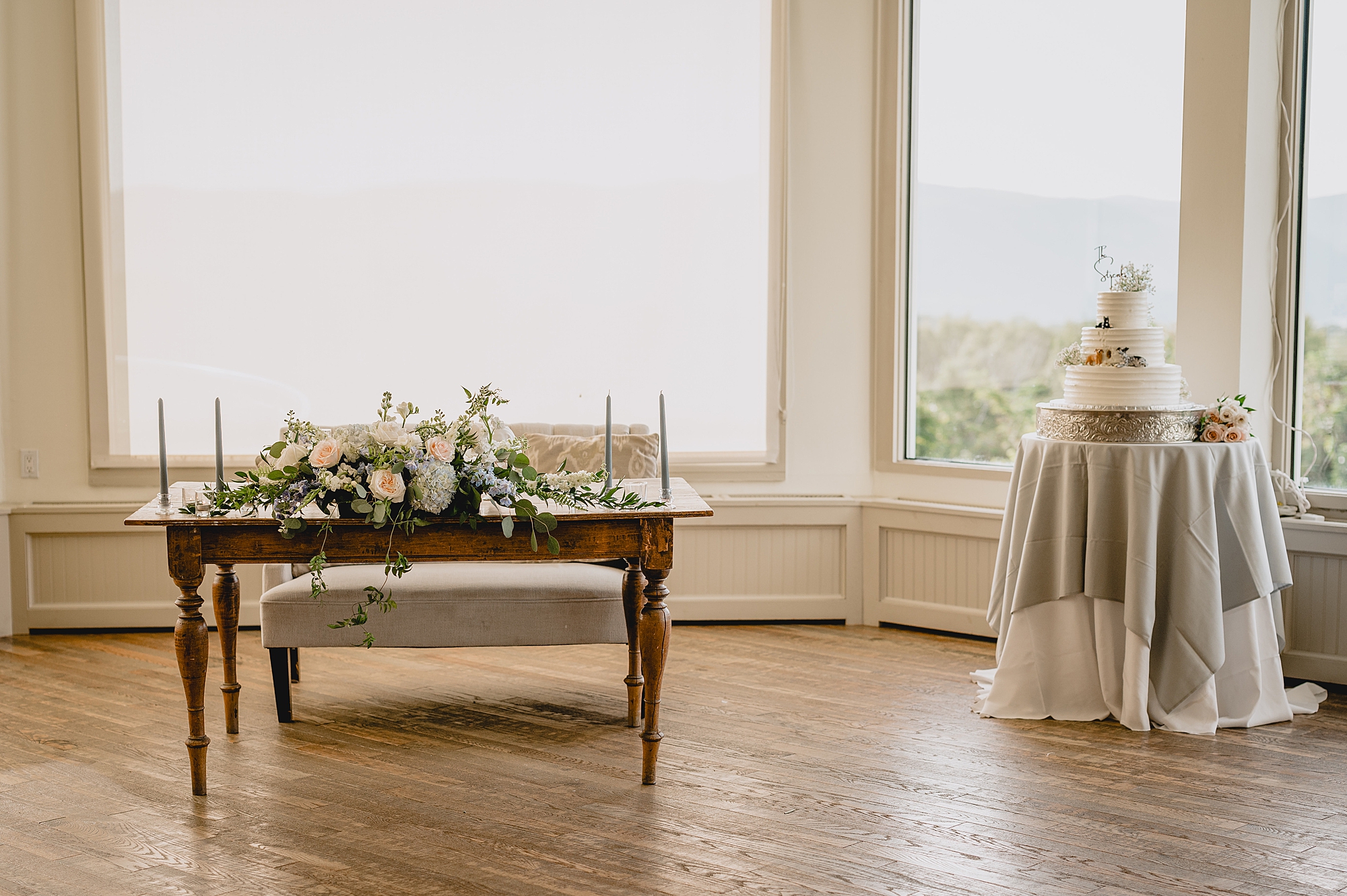 cake table sits near sweetheart table at the Garrison in Hudson NY