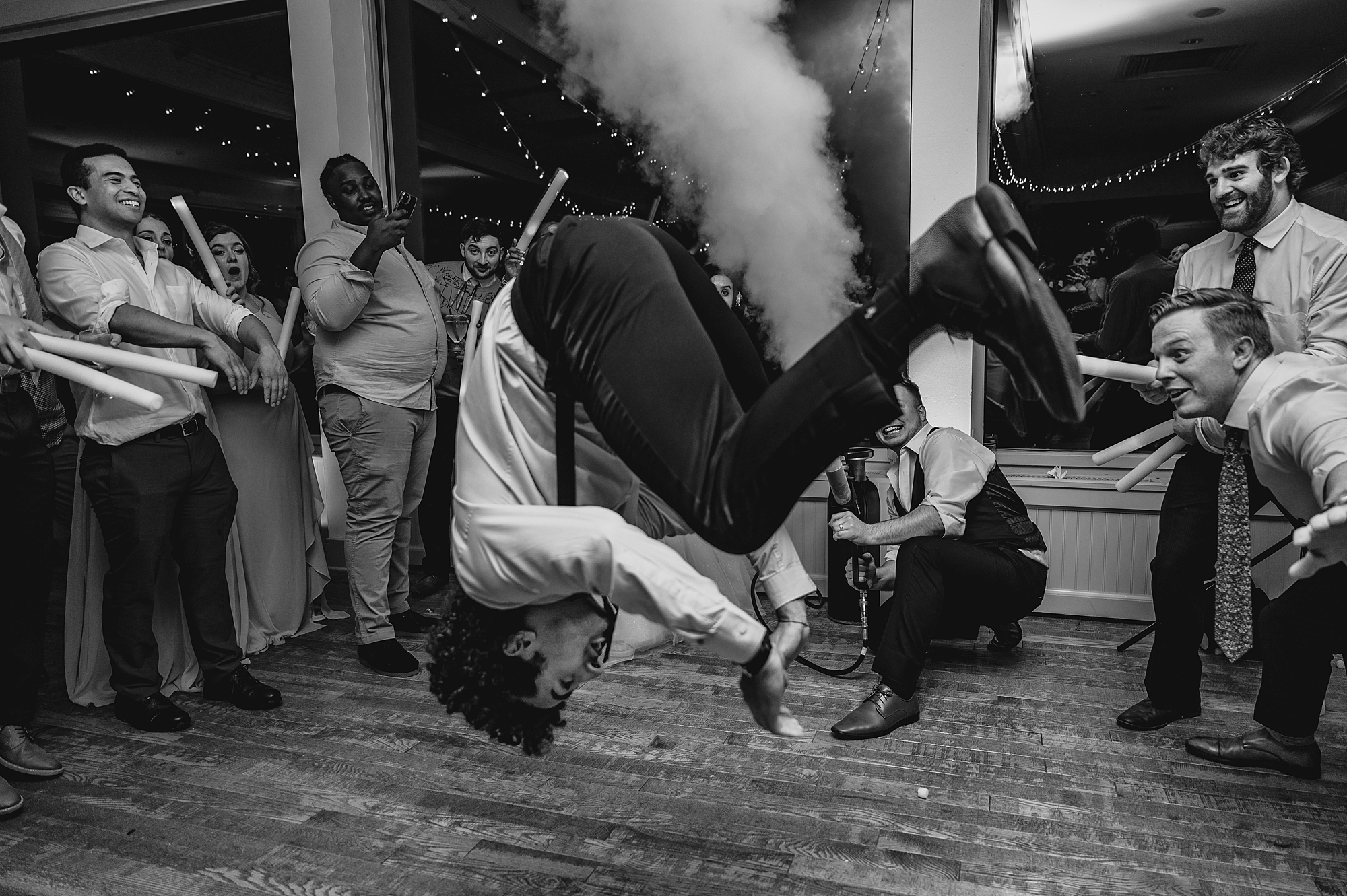 guests play with smoke machine during New York wedding reception