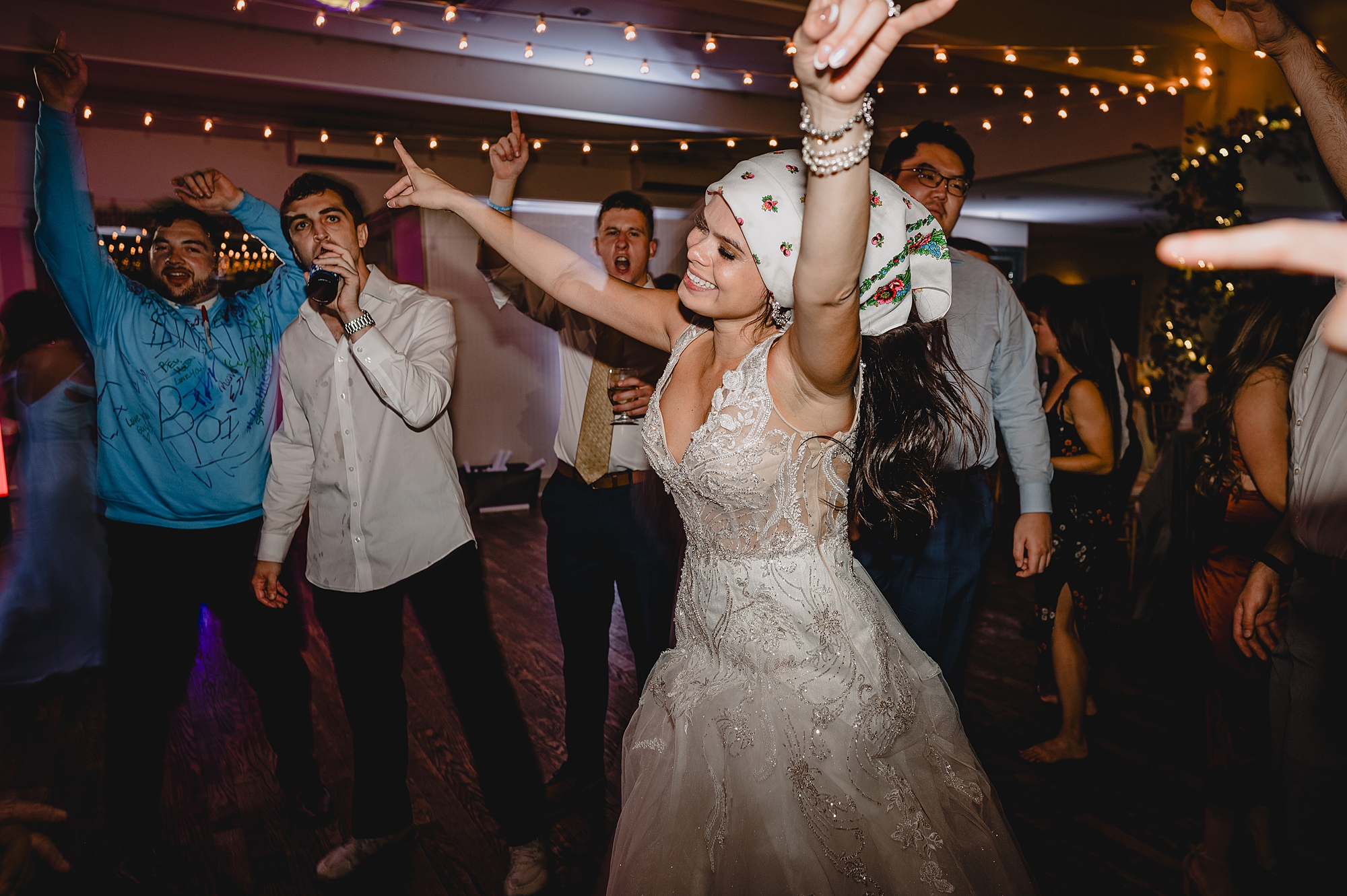 guests dance with glow sticks during NY wedding reception