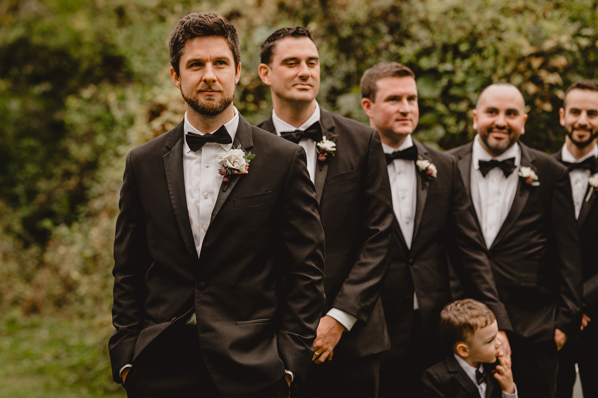 groom watches bride walk down aisle for ceremony at Waterloo Village