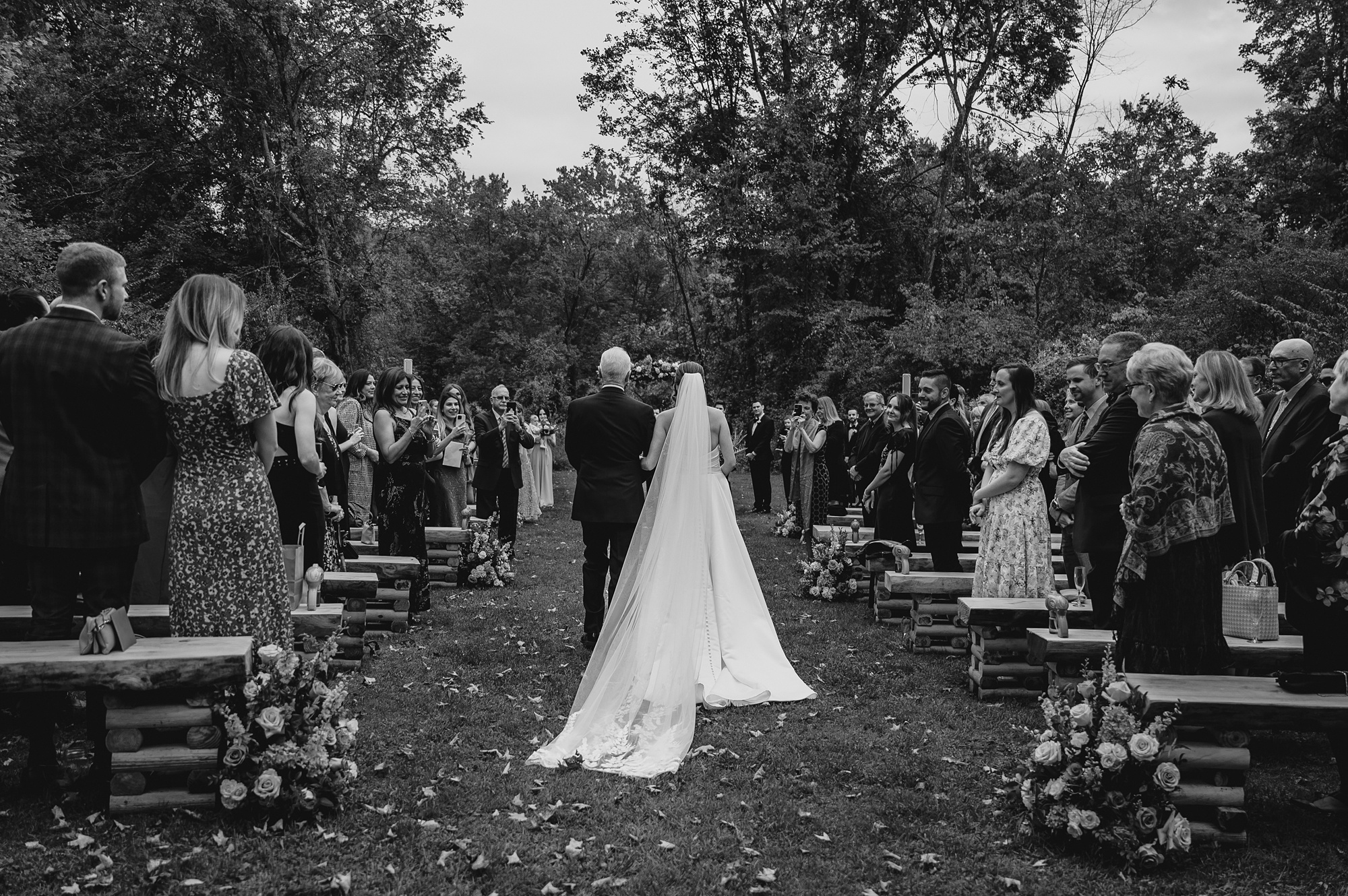 bride and father walk down aisle at Waterloo Village